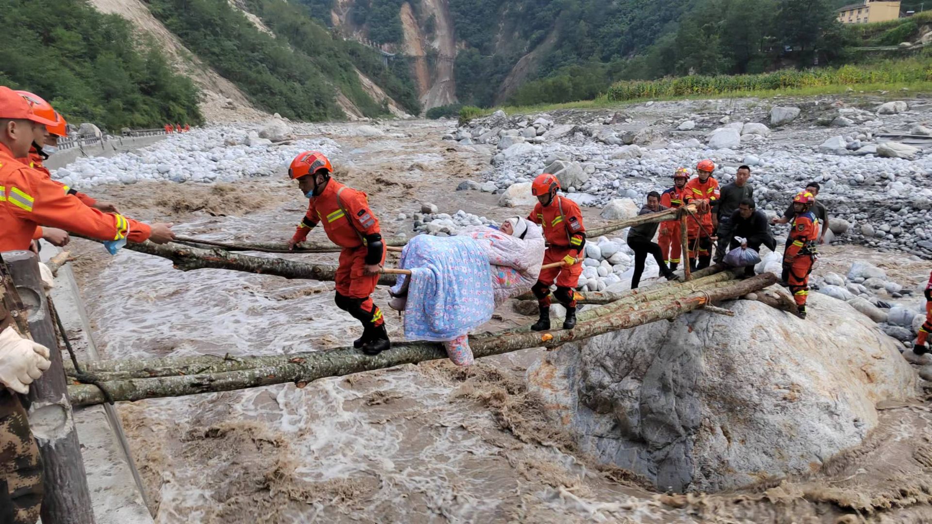Rescuers transfer injured people in Luding county, Ganzi prefecture, Sichuan Province, China, Sept 5