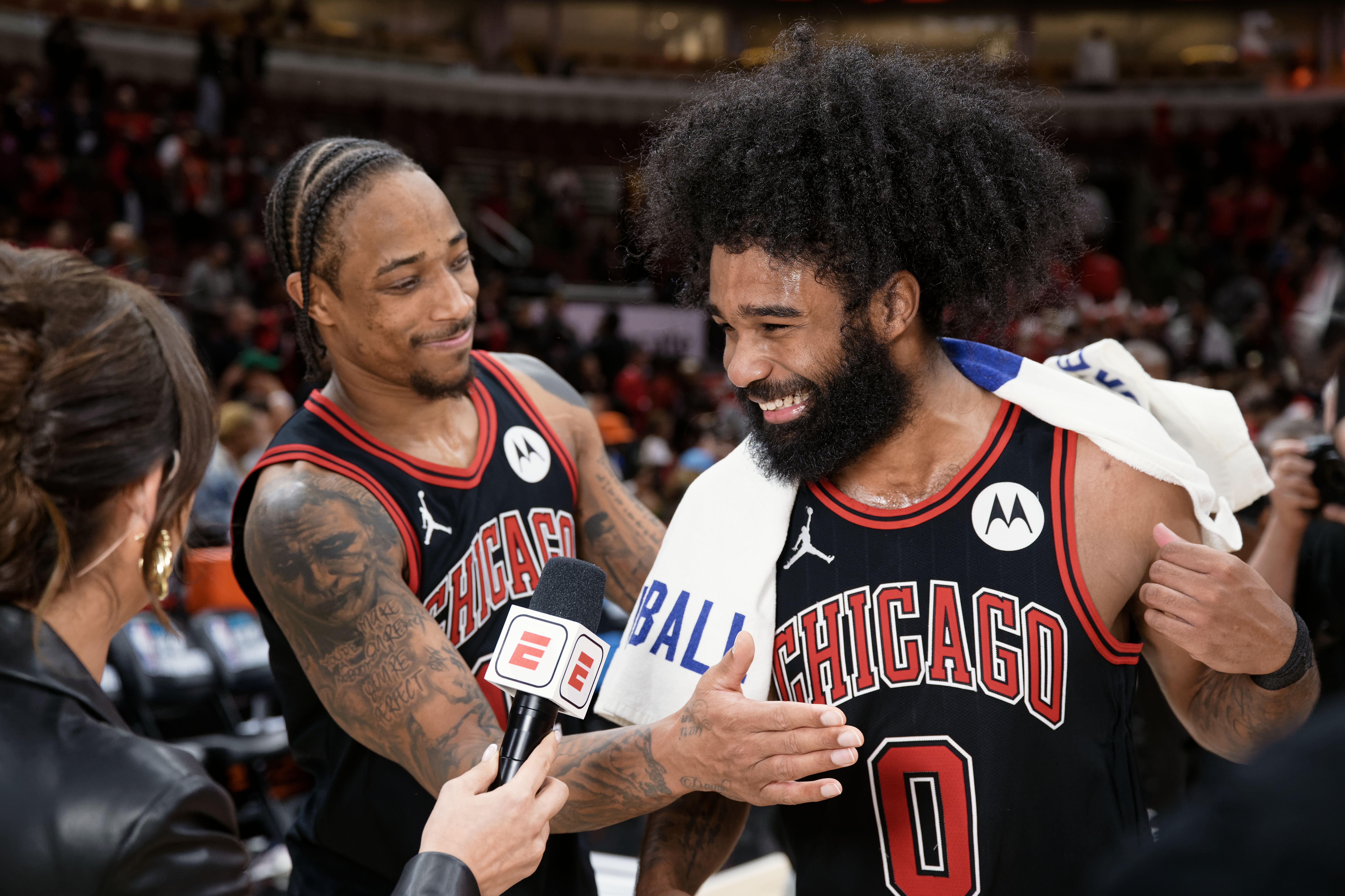 Photo of a player being interviewed after a basketball game 