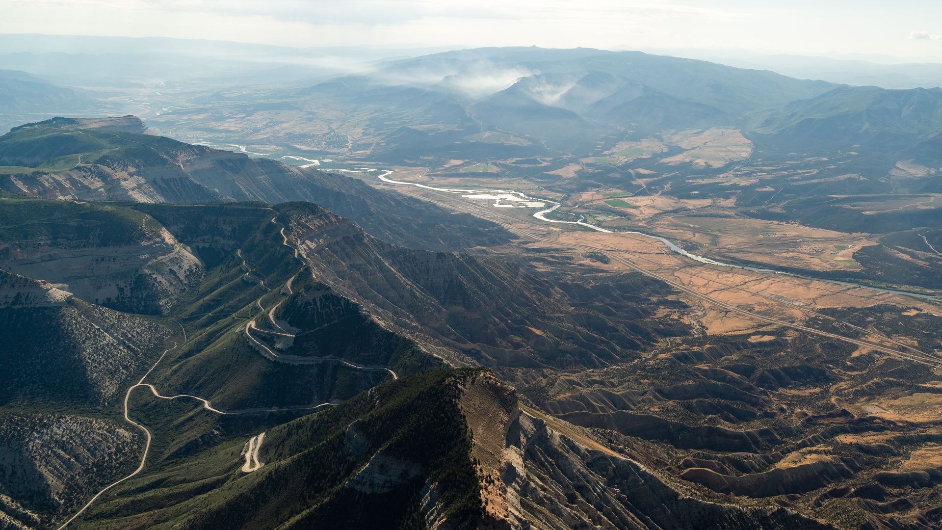 The Spring Creek Fire burns July 12, 2023, along the Colorado River in Parachute July. Photo: Eric Lee/Bloomberg via Getty Images