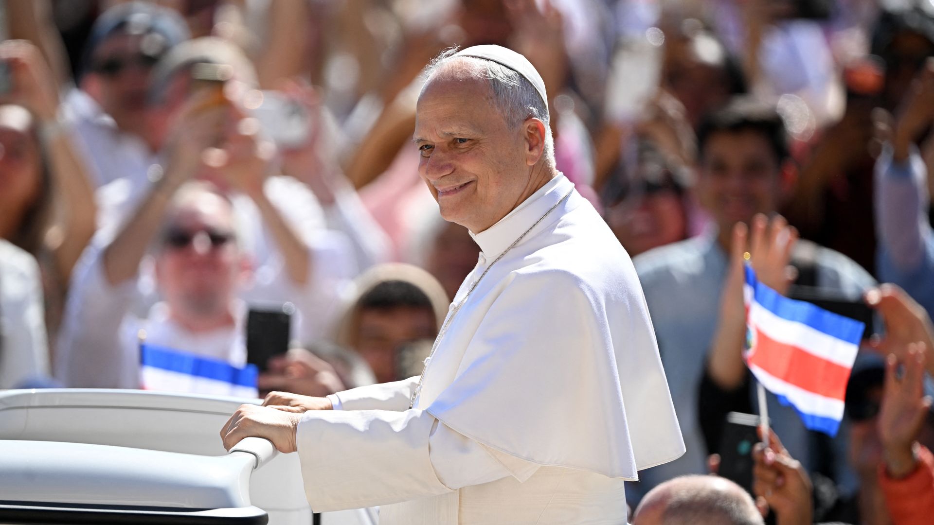 Pope Leo XIV arrives in the popemobile for the weekly general audience at St Peter's Square in the Vatican on May 20, 2026. 