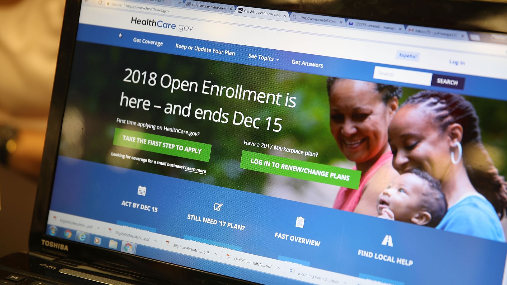 A laptop screen showing the 2018 enrollment page for ACA