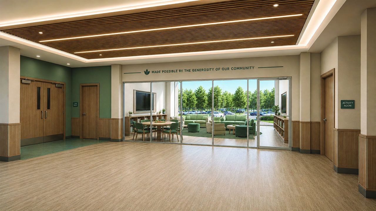 Bright hallway opens to a glass-walled lounge with green seating, round tables, and a wall TV. Outside, trees and parked cars are visible. A sign reads "Activity Room" on the right.