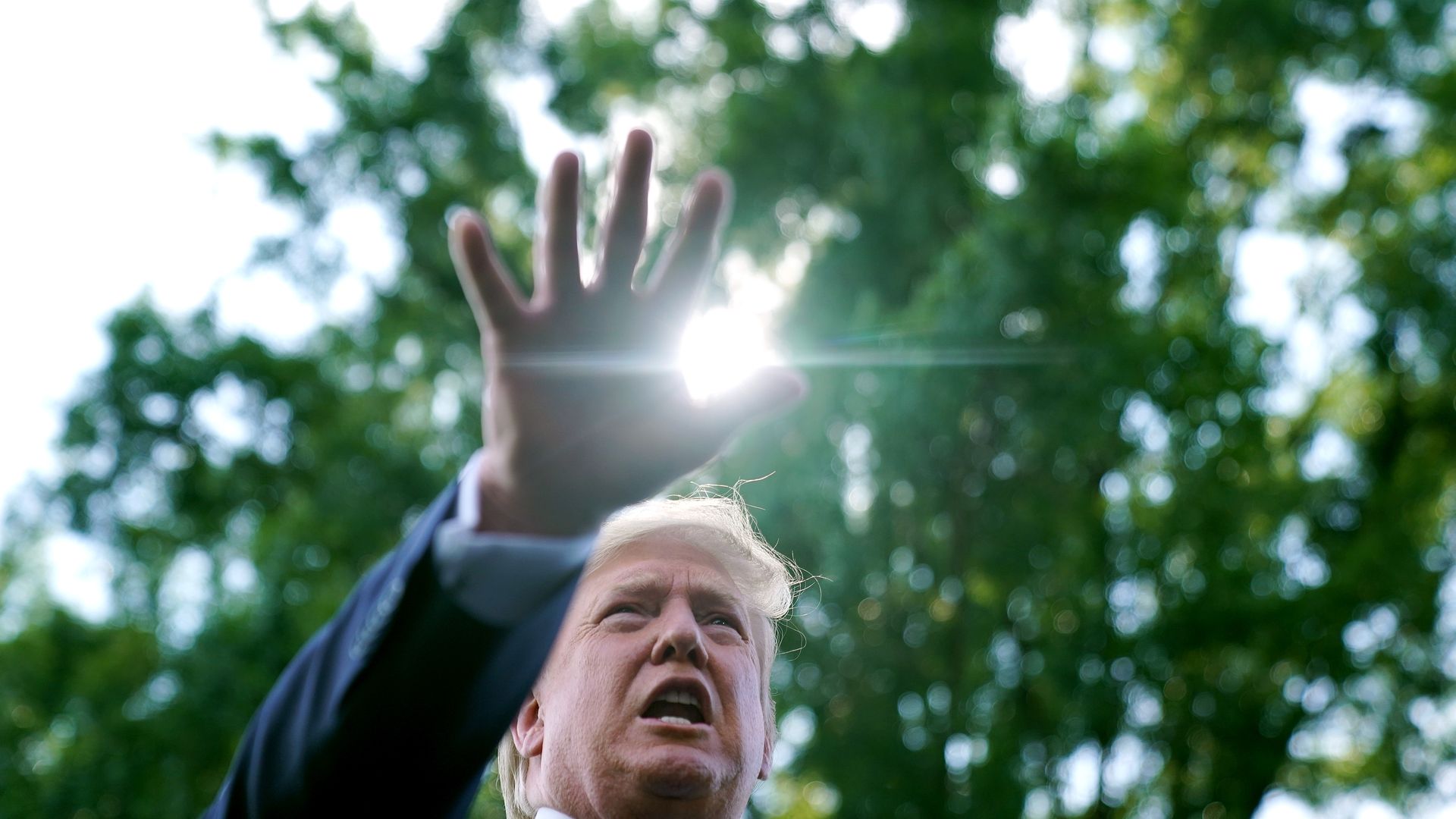 President Trump talks to journalists before boarding Marine One