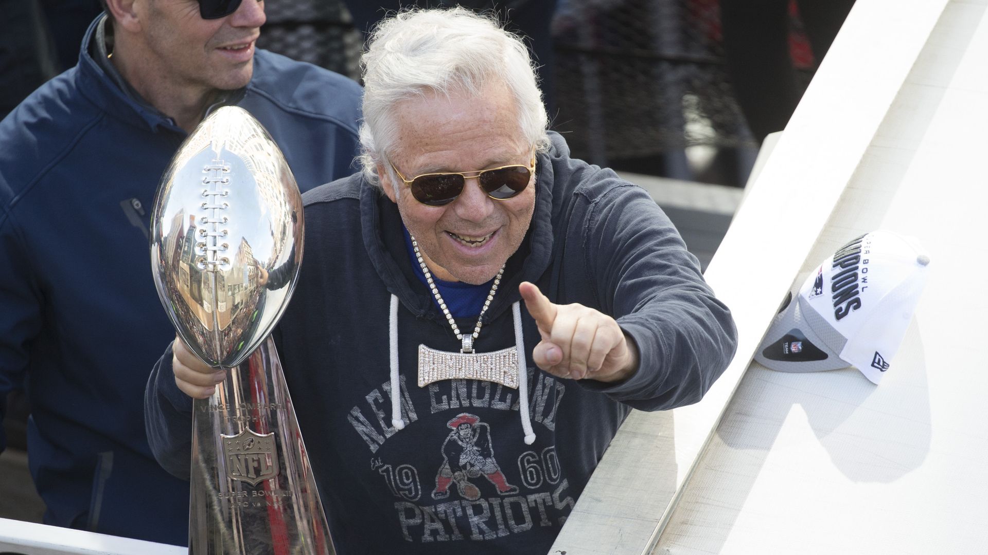 Bob Kraft with a Super Bowl trophy