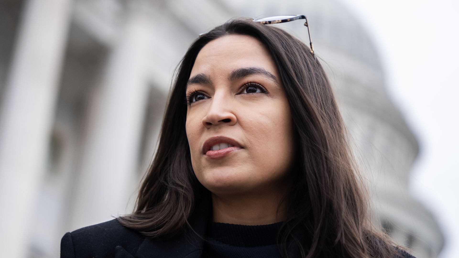 Rep. Alexandria Ocasio-Cortez speaks to reporters outside the U.S. Capitol on Jan. 9. 