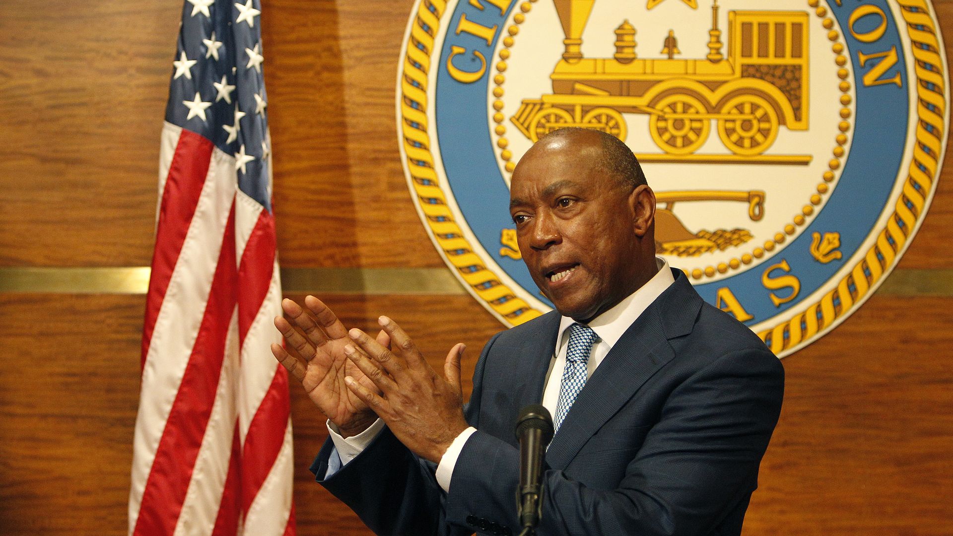 Former Houston Mayor Sylvester Turner speaks at a podium