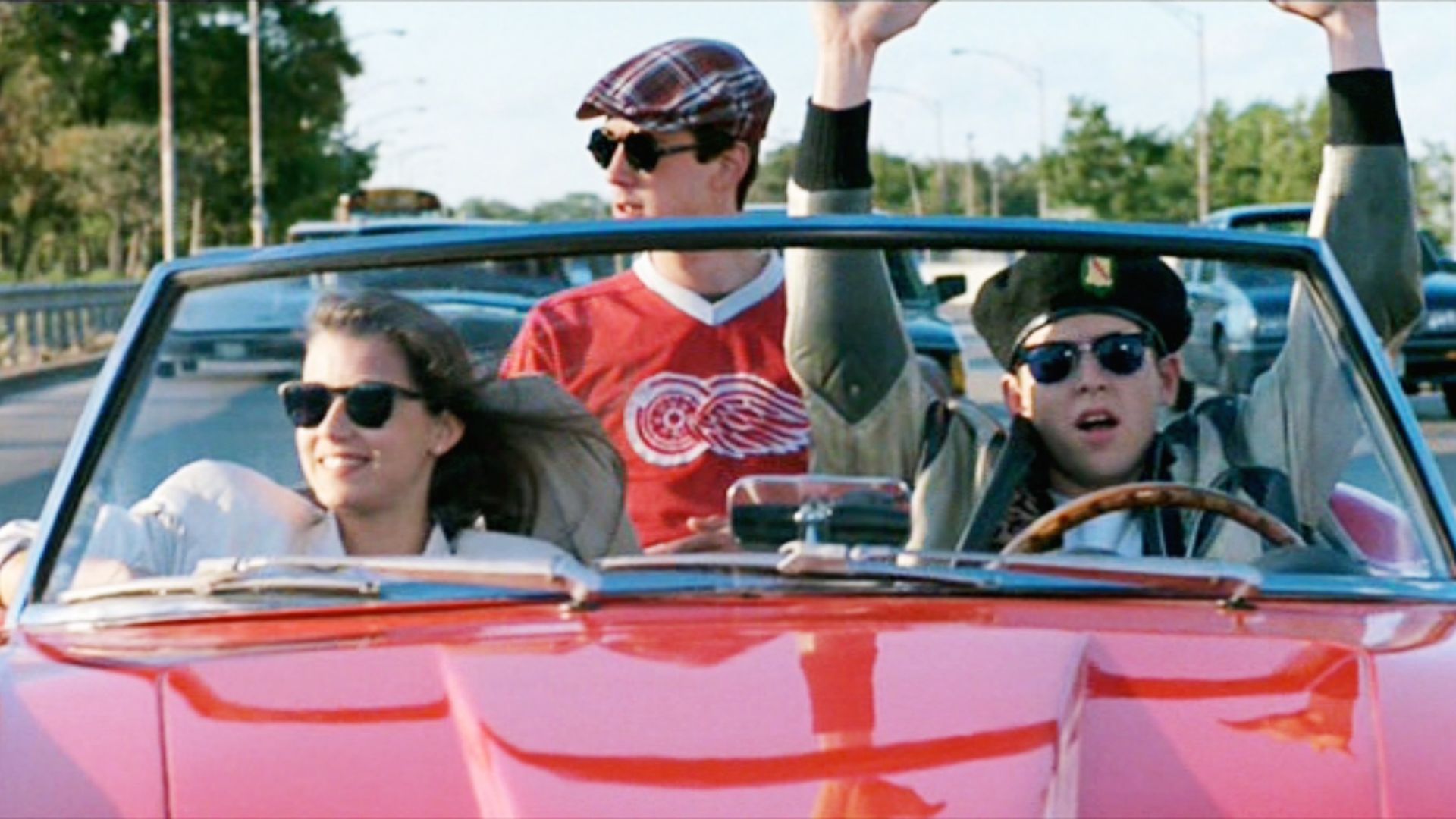 Mia Sara, Alan Ruck and Matthew Broderick in a red convertible in "Ferris Bueller's Day Off."