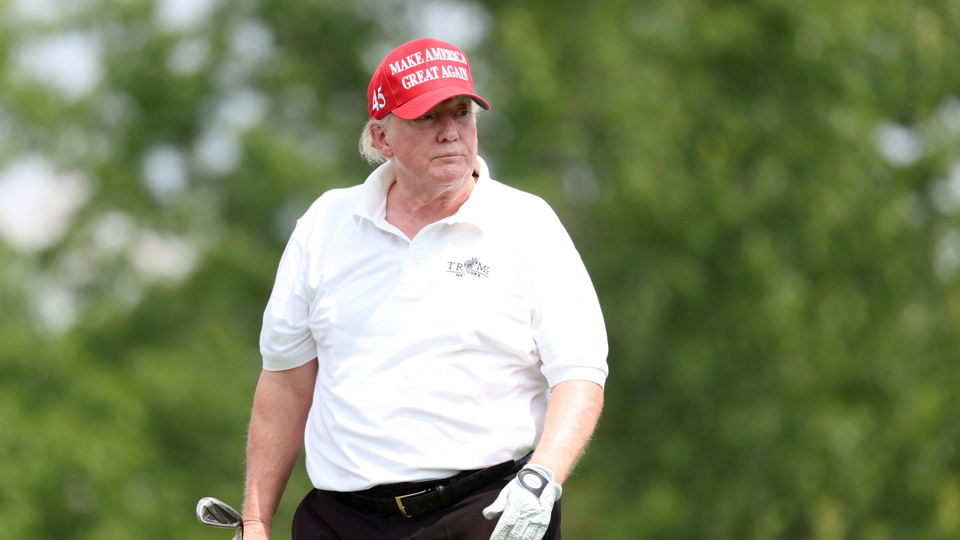 Former U.S. President Donald Trump watches a shot during the pro-am prior to the LIV Golf Invitational - Bedminster at Trump National Golf Club Bedminster
