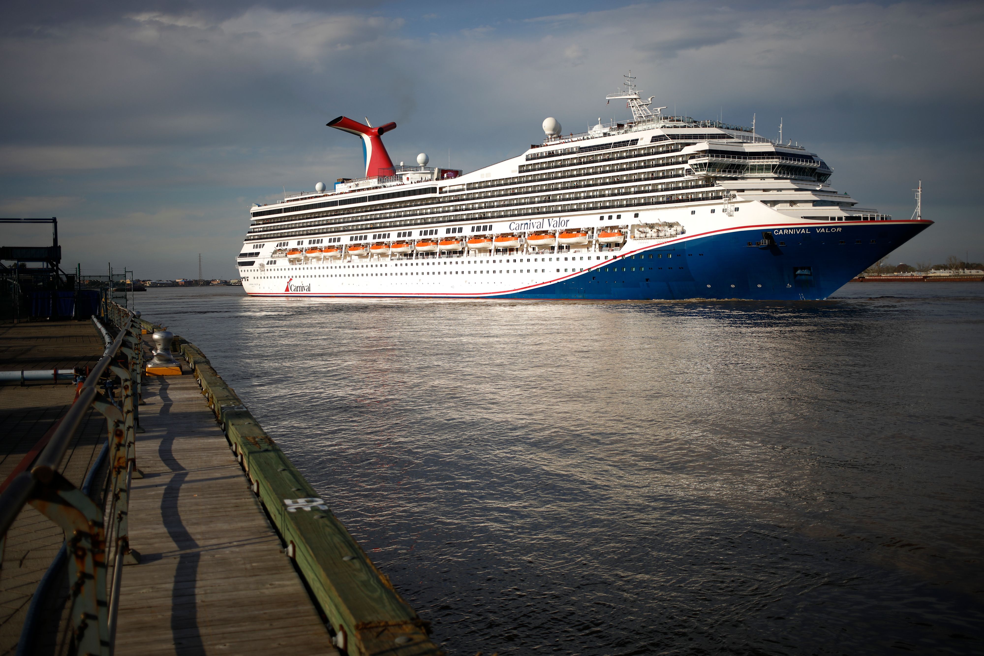 Photo shows the Carnival Valor cruise ship leaving the Port of New Orleans