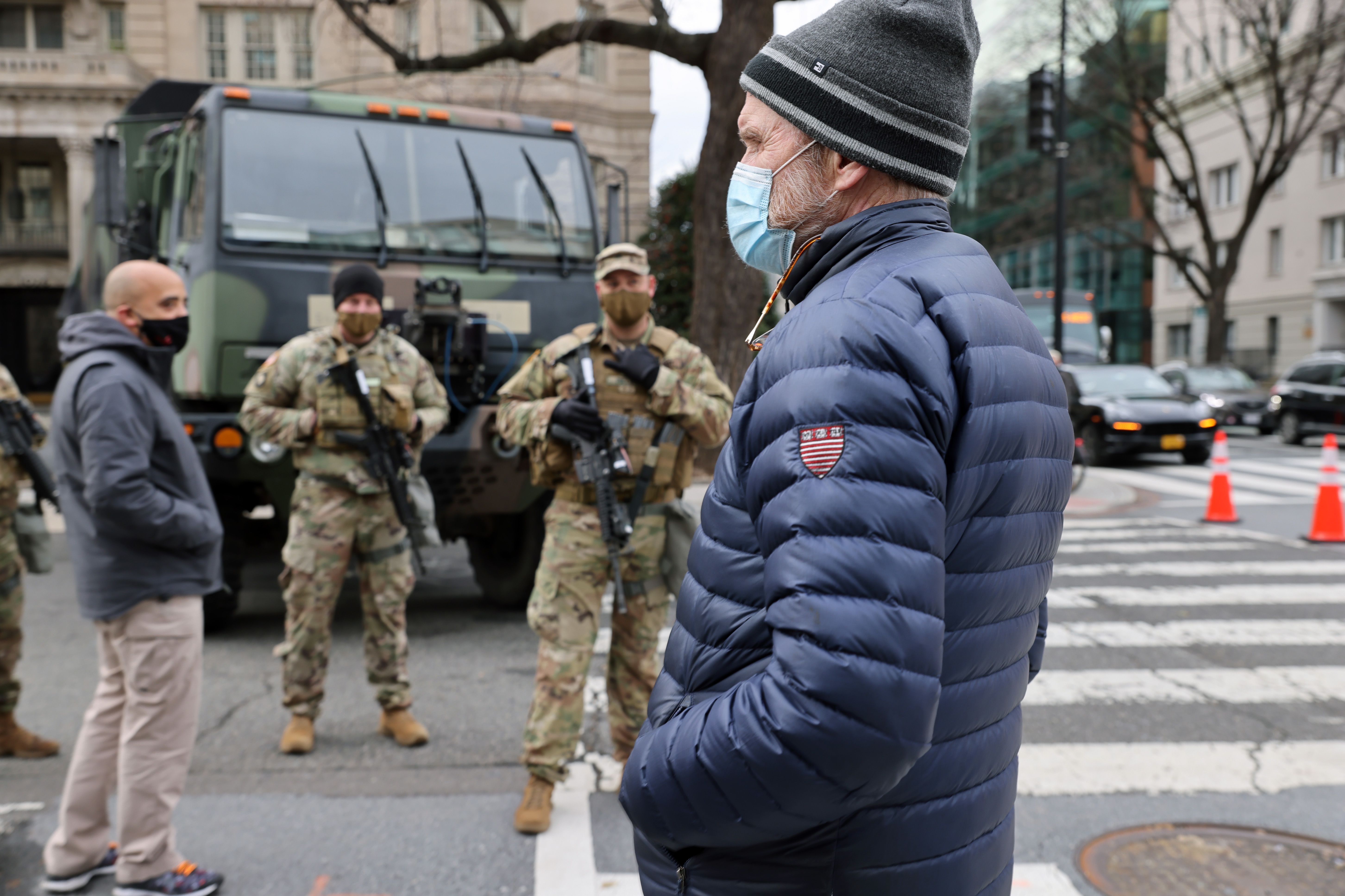 Members of the National Guard stand guard at a street junction in Washington, D.C., on Jan. 16. 