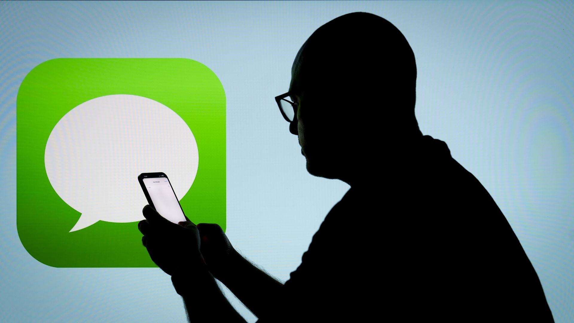 The Apple iMessage app and logo are seen in this photo illustration