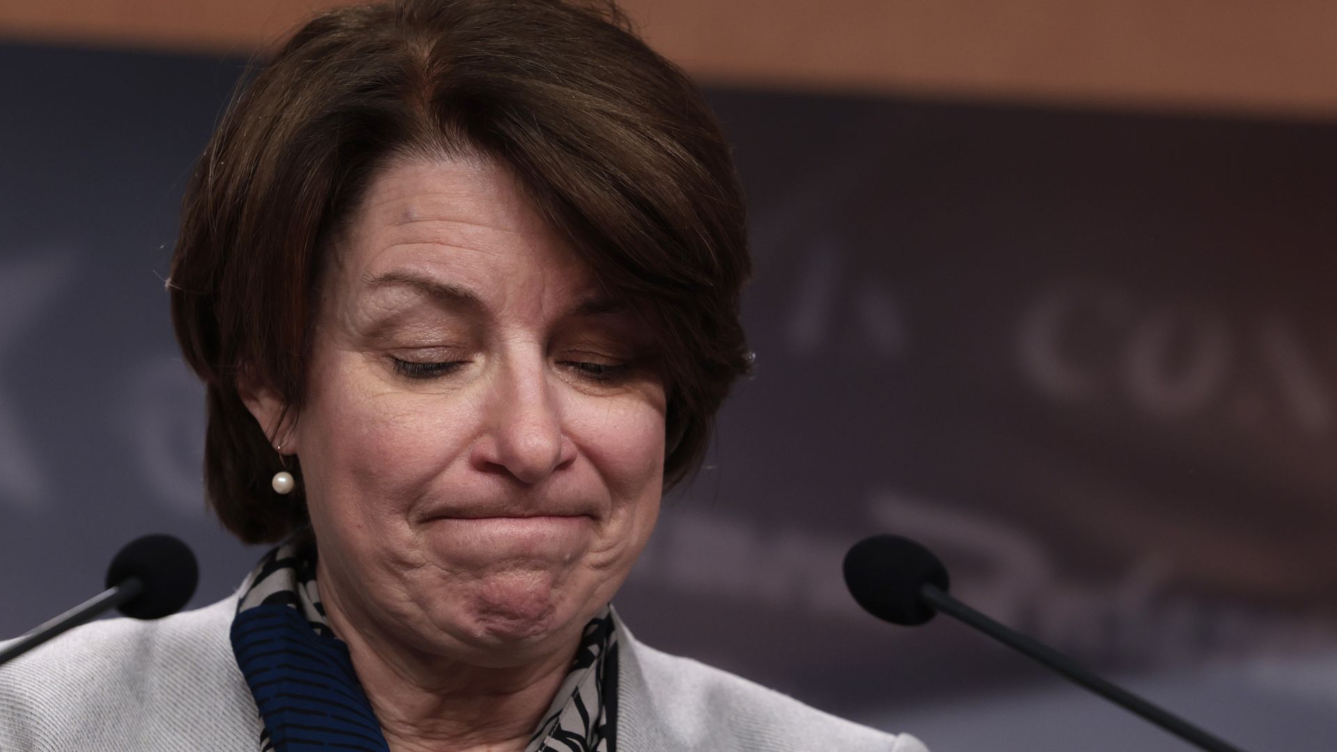 Photo of Sen. Amy Klobuchar's face with her lips pursed