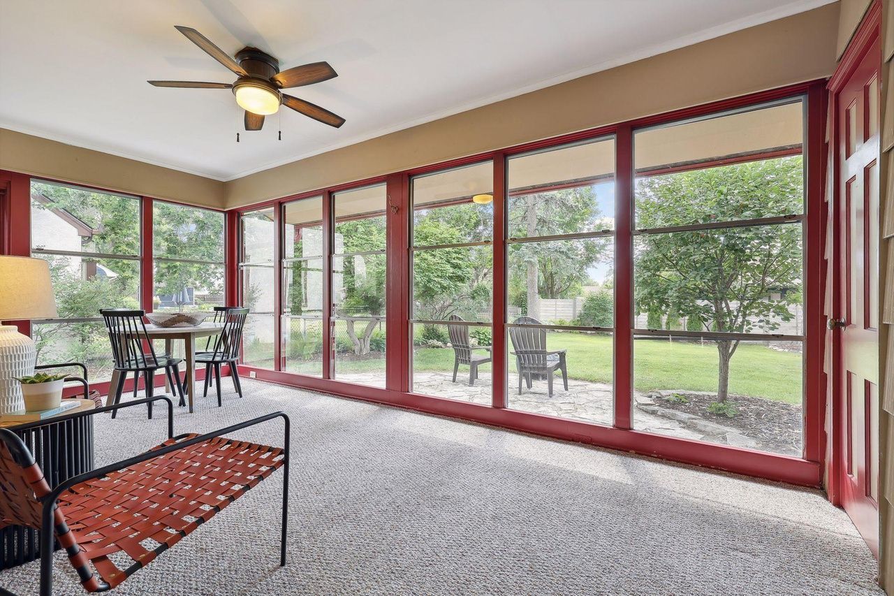 large three-season porch with view of yard