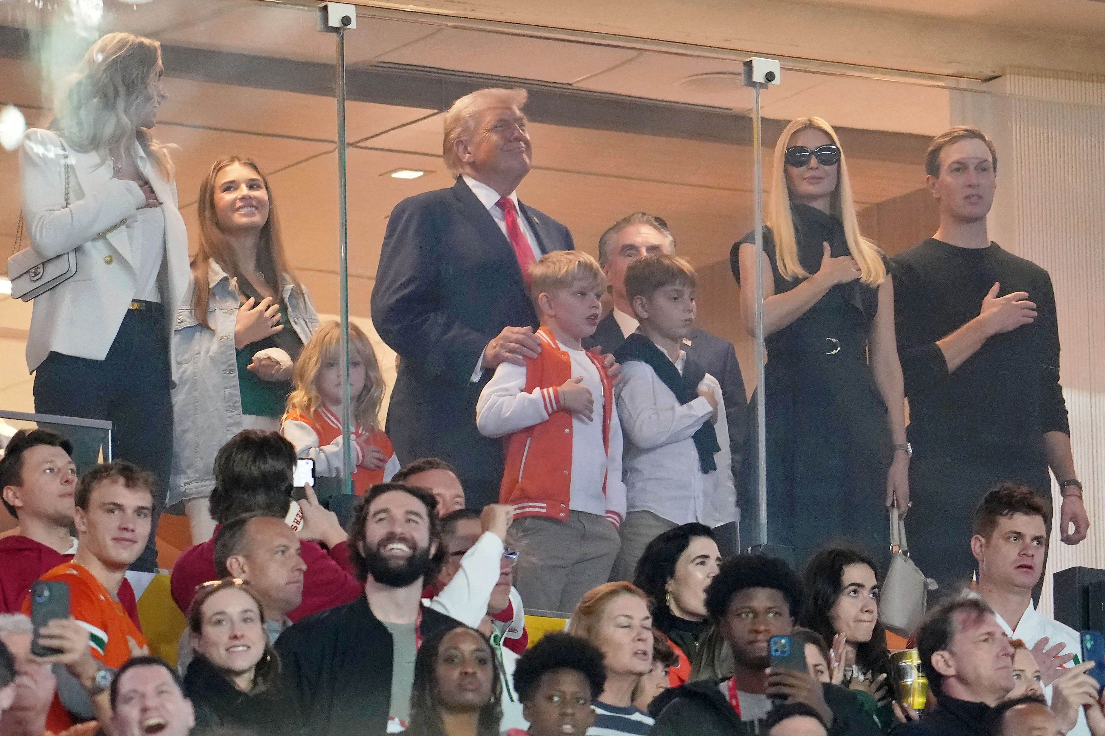 Miami Gardens, FL, USA; Lara Trump, Kai Trump, United States President Donald Trump, Ivanka Trump, and Jared Kushner look on during the national anthem before the CFP National Championship college football game between the Indiana Hoosiers and the Miami Hurricanes at Hard Rock Stadium. Mandatory Cre