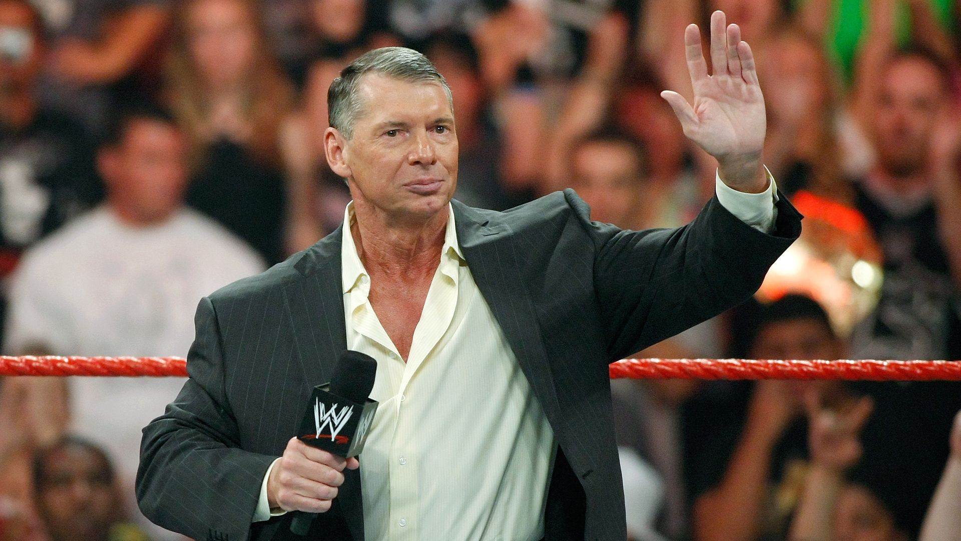  World Wrestling Entertainment Inc. Chairman Vince McMahon waves at the audience from the ring in 2009.