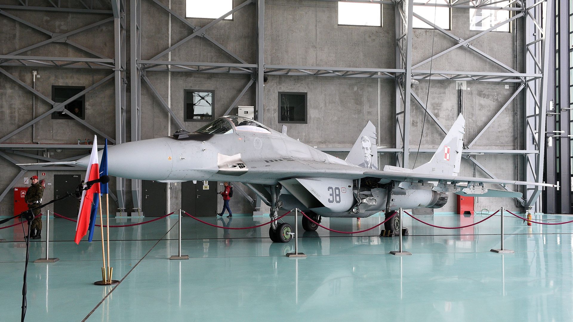 A Polish MiG fighter jet is seen in a hangar in Warsaw.