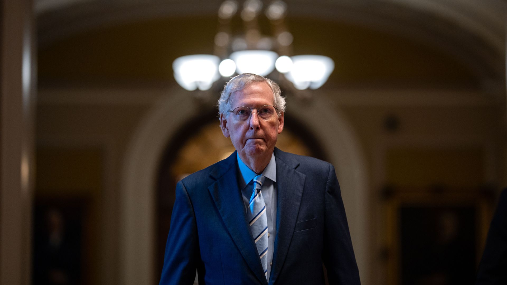 Senate Minority Leader Mitch McConnell (R-KY) walks to his office from the Senate Chamber at the U.S. Capitol 
