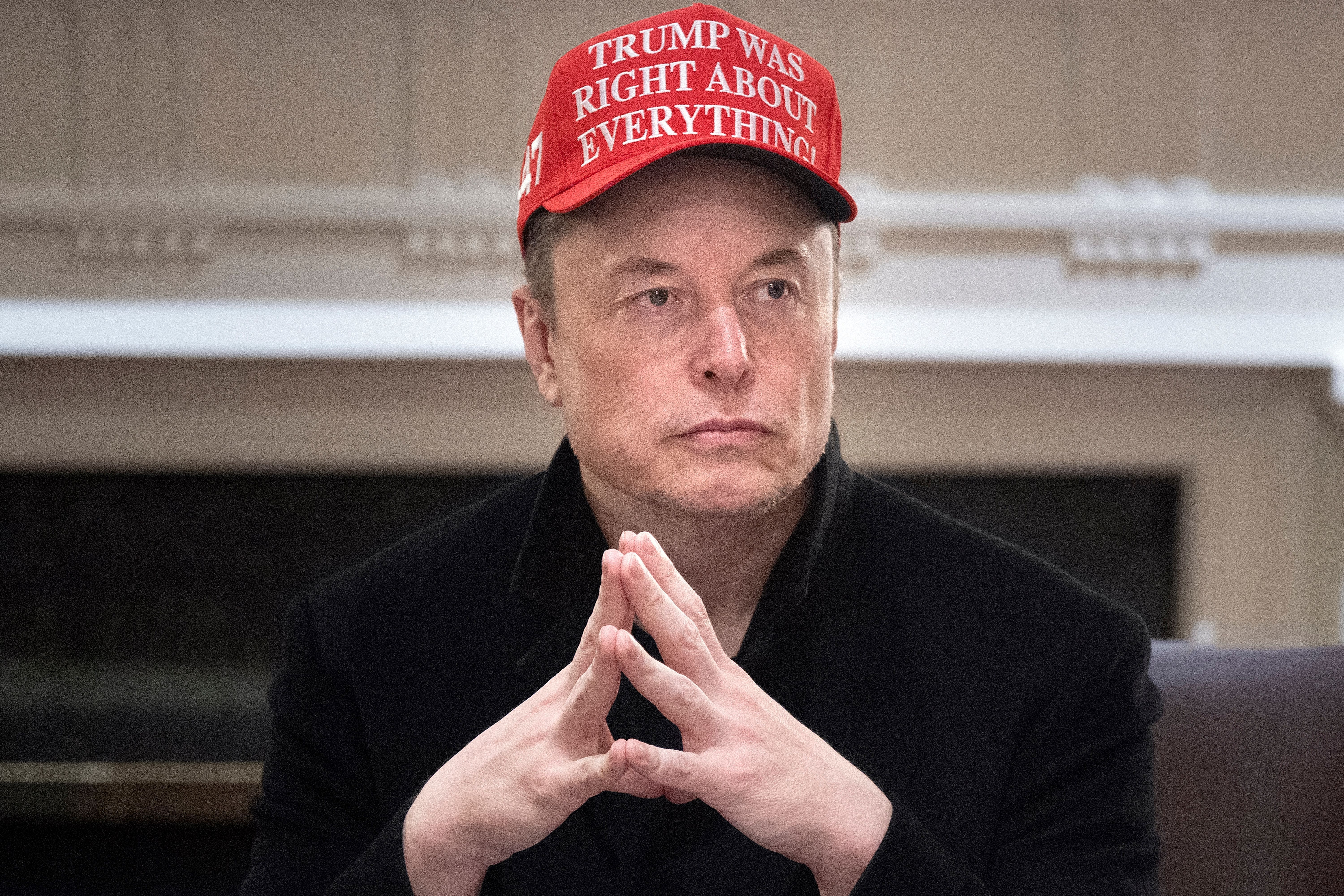 TOPSHOT - Elon Musk looks on during a Cabinet Meeting in the Cabinet Room of the White House March 24, 2025 in Washington, DC. (Photo by Brendan Smialowski / AFP) (Photo by BRENDAN SMIALOWSKI/AFP via Getty Images)