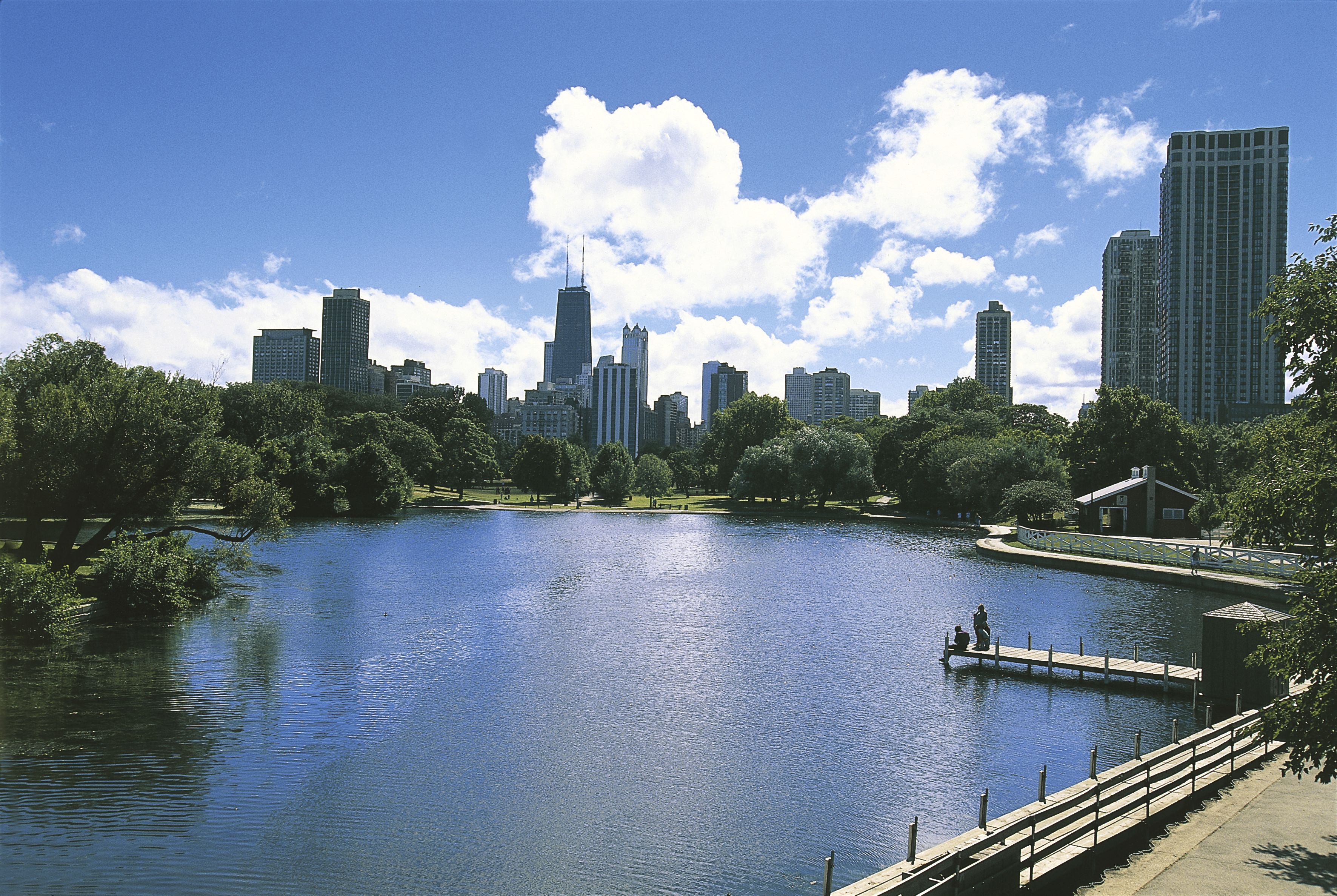 A pond in Lincoln Park with the Chicago skyline in the background.