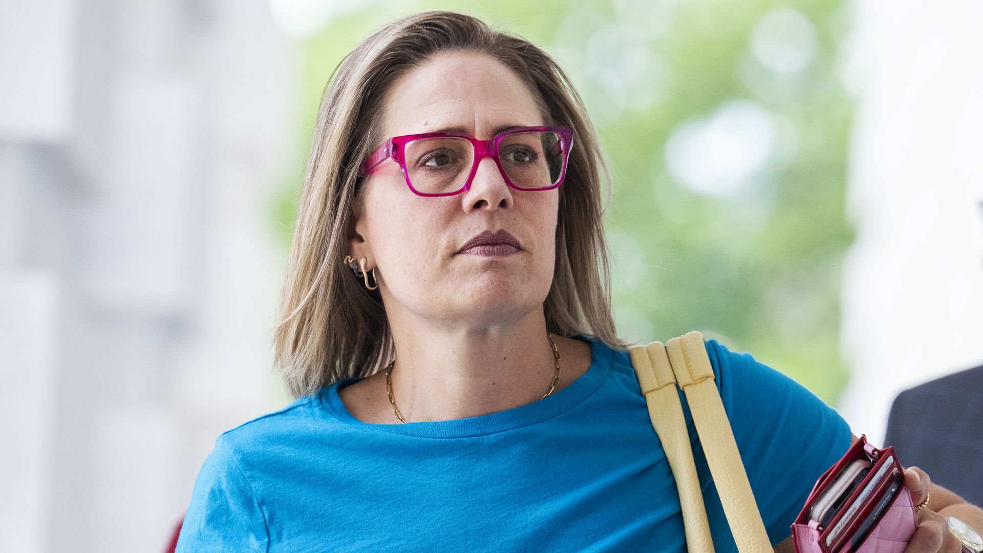 Sen. Kyrsten Sinema is seen arriving at the Capitol on Thursday.