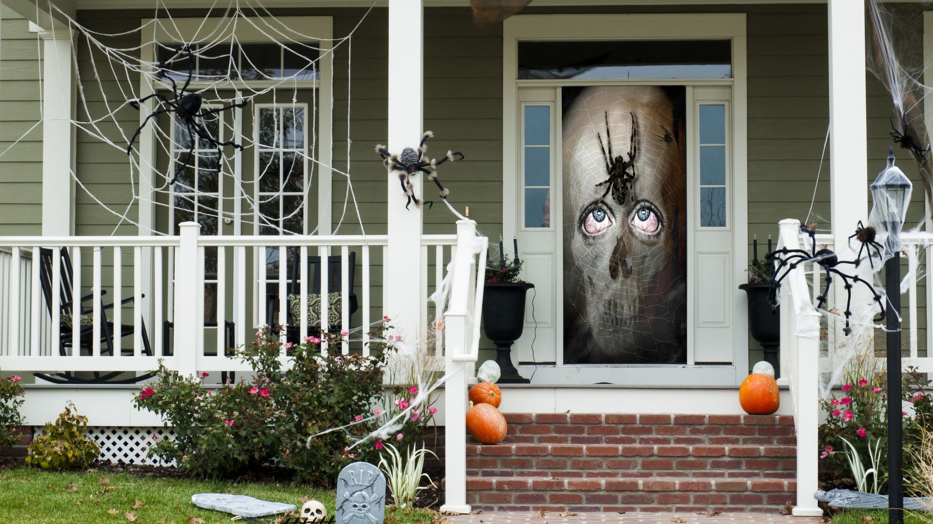 A door decorate in halloween stuff.