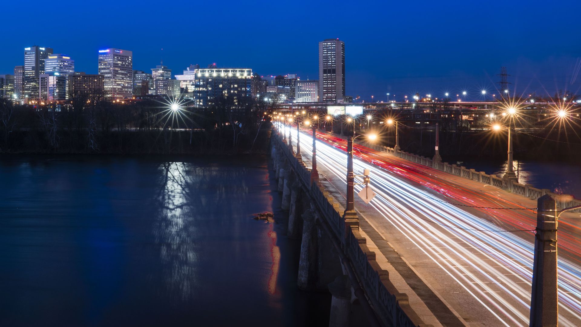 Sunset view on James River with Car trails of historic southern Richmond, Virginia. 