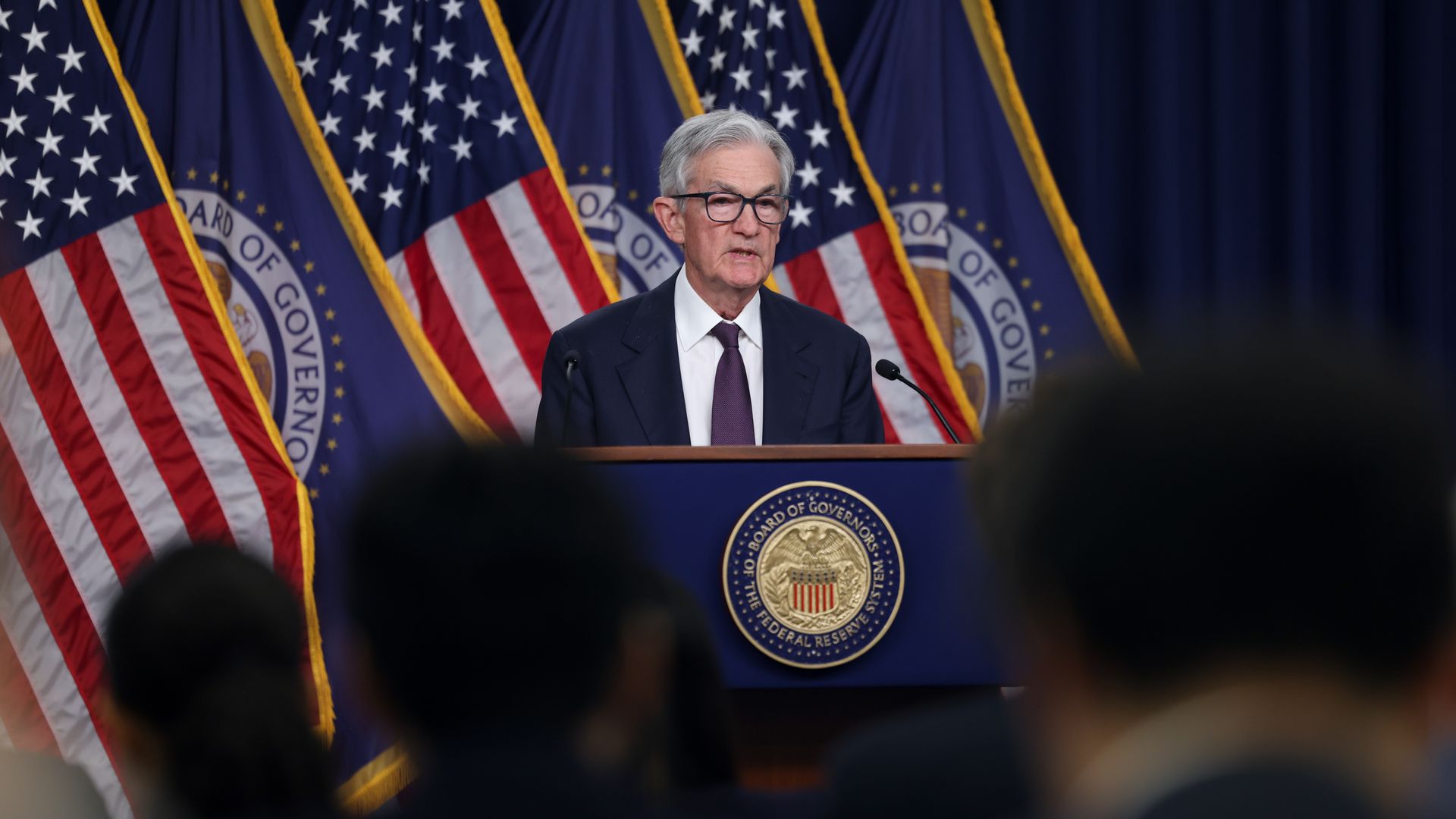 Powell at a podium