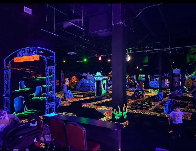 a neon mini golf course