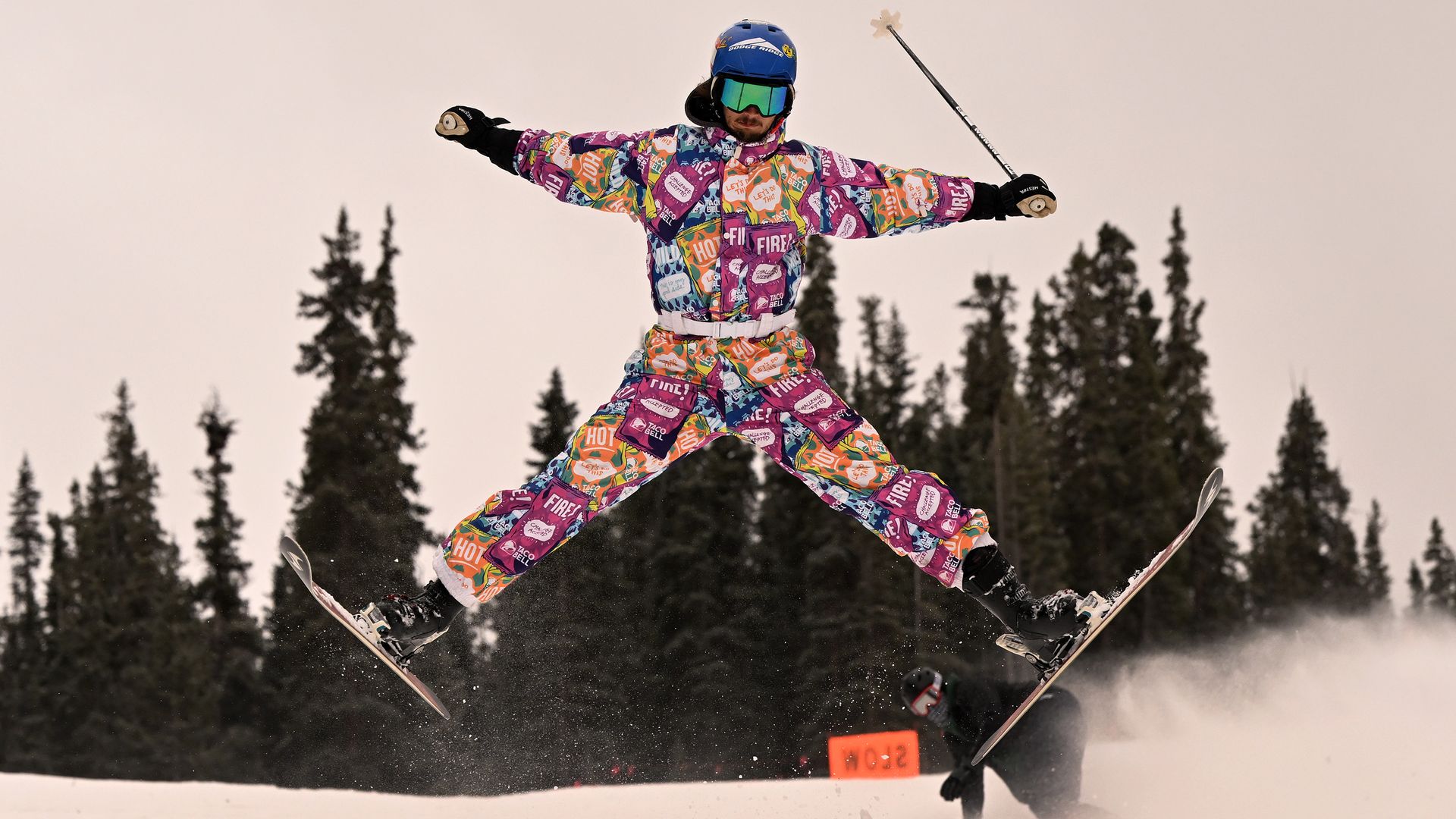 Skier Andrew Hoff catches some air off a jump on the first day of the 2022-23 ski season Arapahoe Basin Ski Area. Photo: Helen H. Richardson/Denver Post via Getty Images