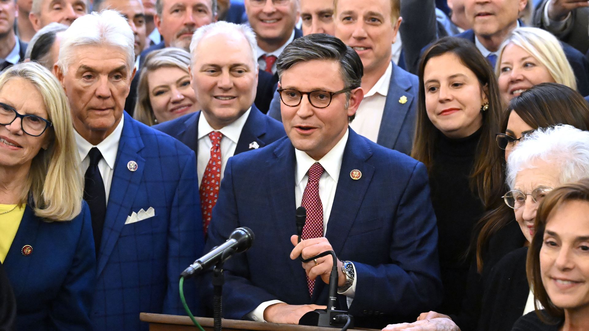 Mike Johnson speaks at a press conference