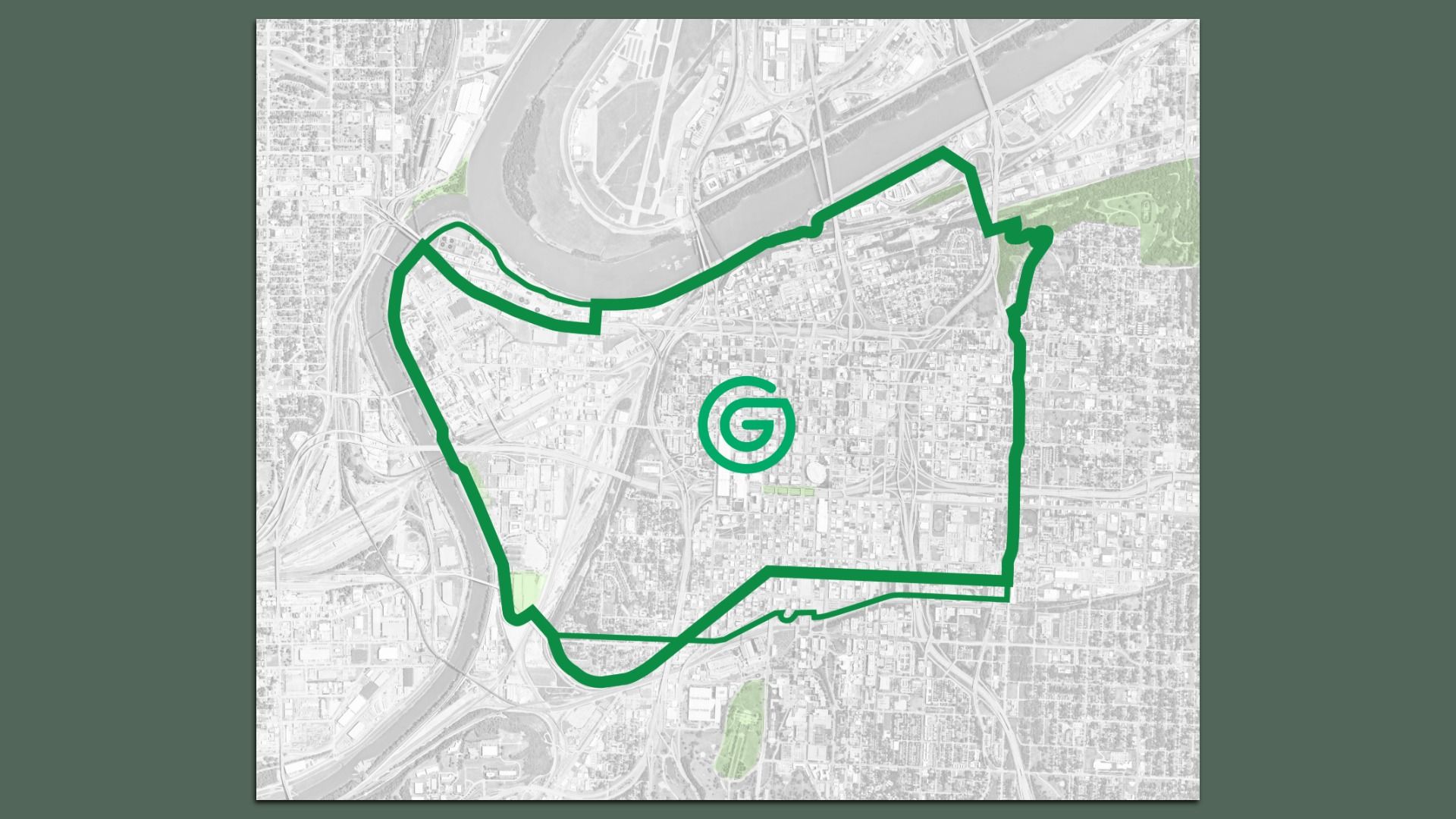 A grayscale city map with a bold green outlined boundary encircling part of the urban area. A green spiral "G" logo sits inside, with a river and roads visible in the background.