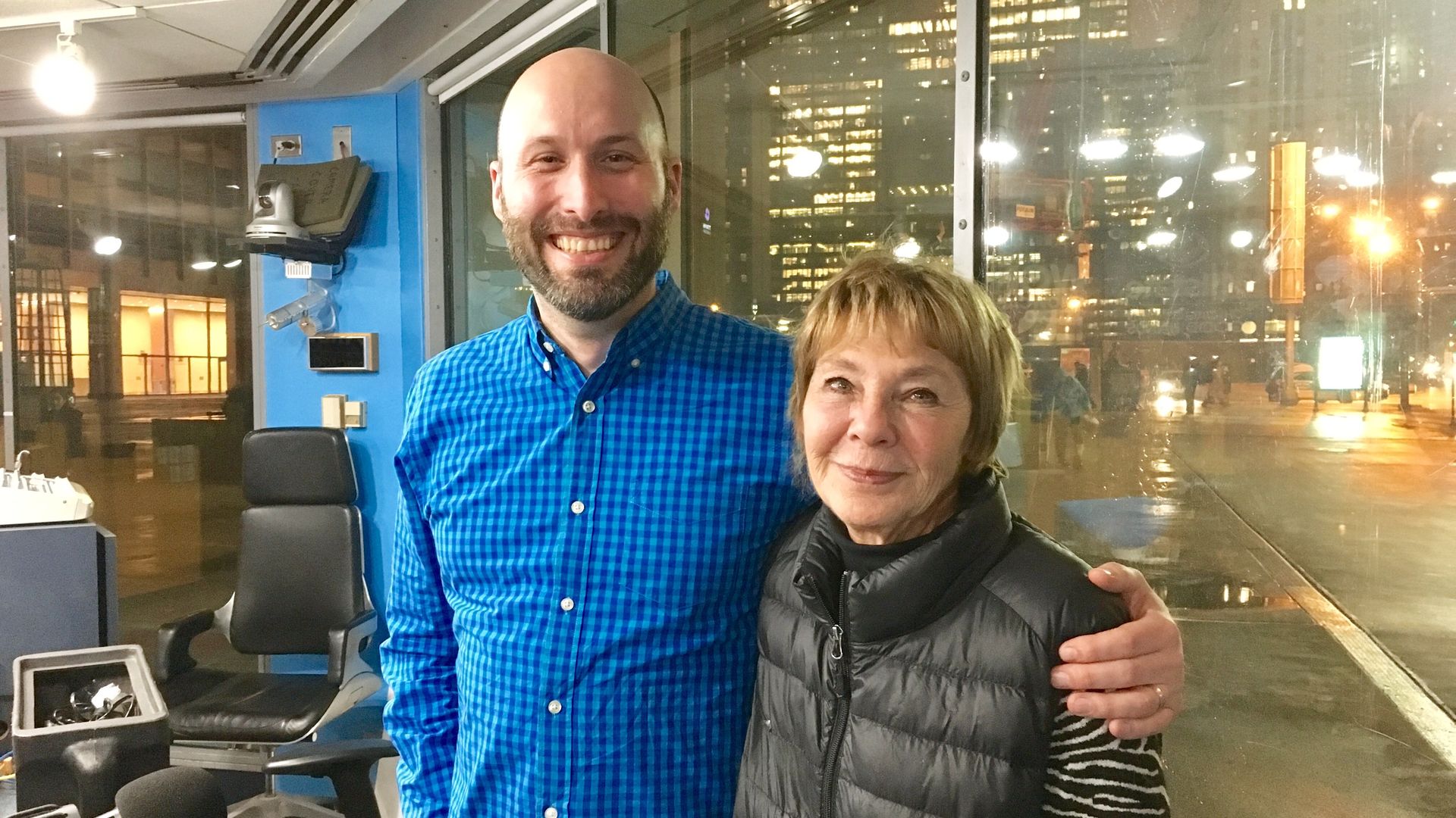 Photo of a man and woman posing for the camera
