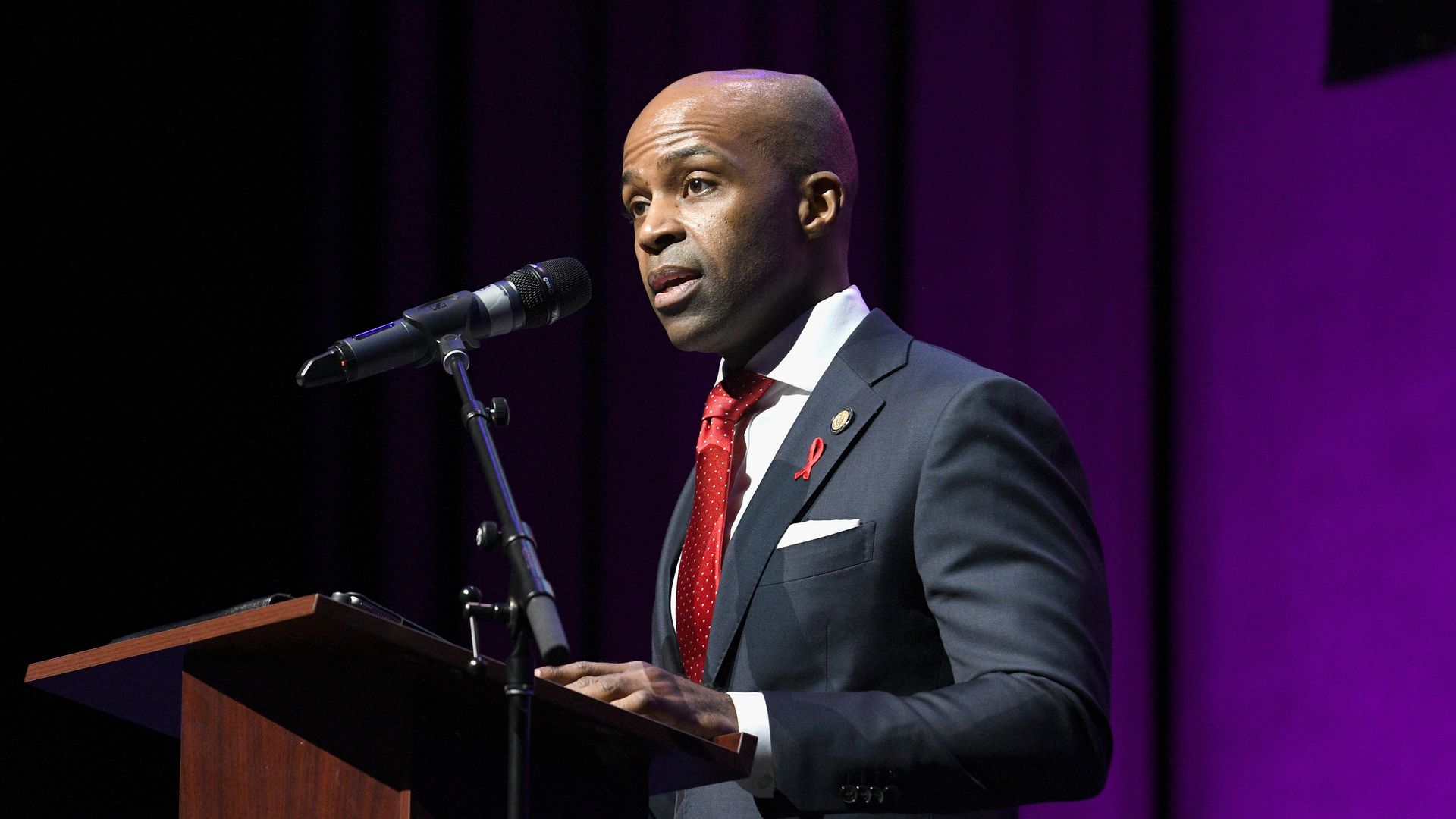 Photo of Alphonso David speaking from a podium