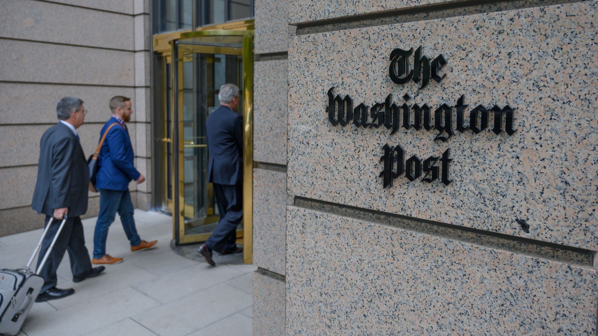 People entering the Washington Post building in D.C. in 2019.