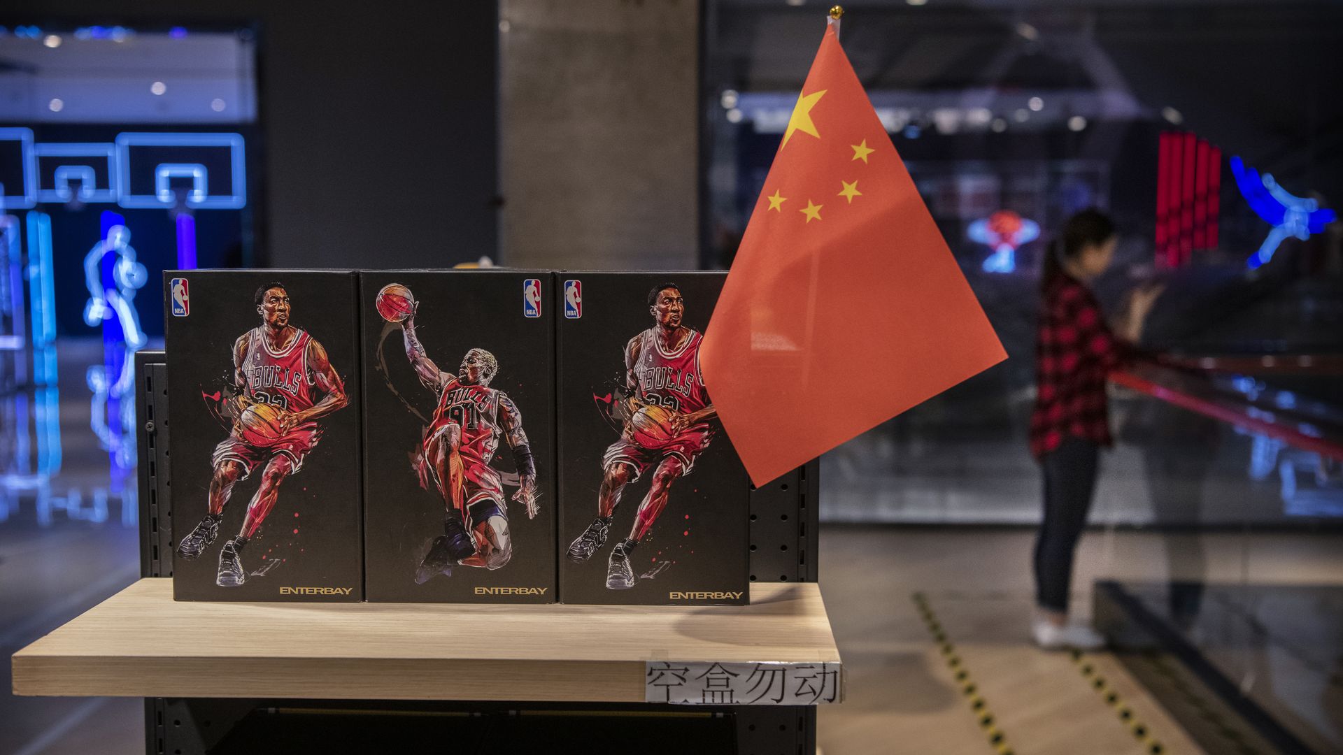 A Chinese flag is seen placed on merchandise in the NBA flagship retail store on October 9, 2019 in Beijing, China.A Chinese flag is seen