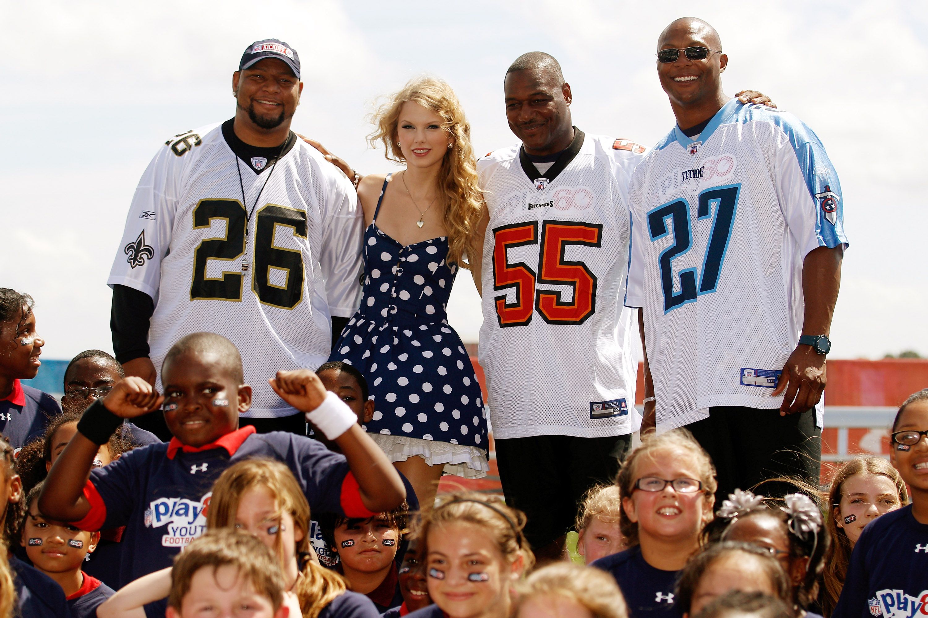 Photo shows Taylor Swift with Deuce McAllister.