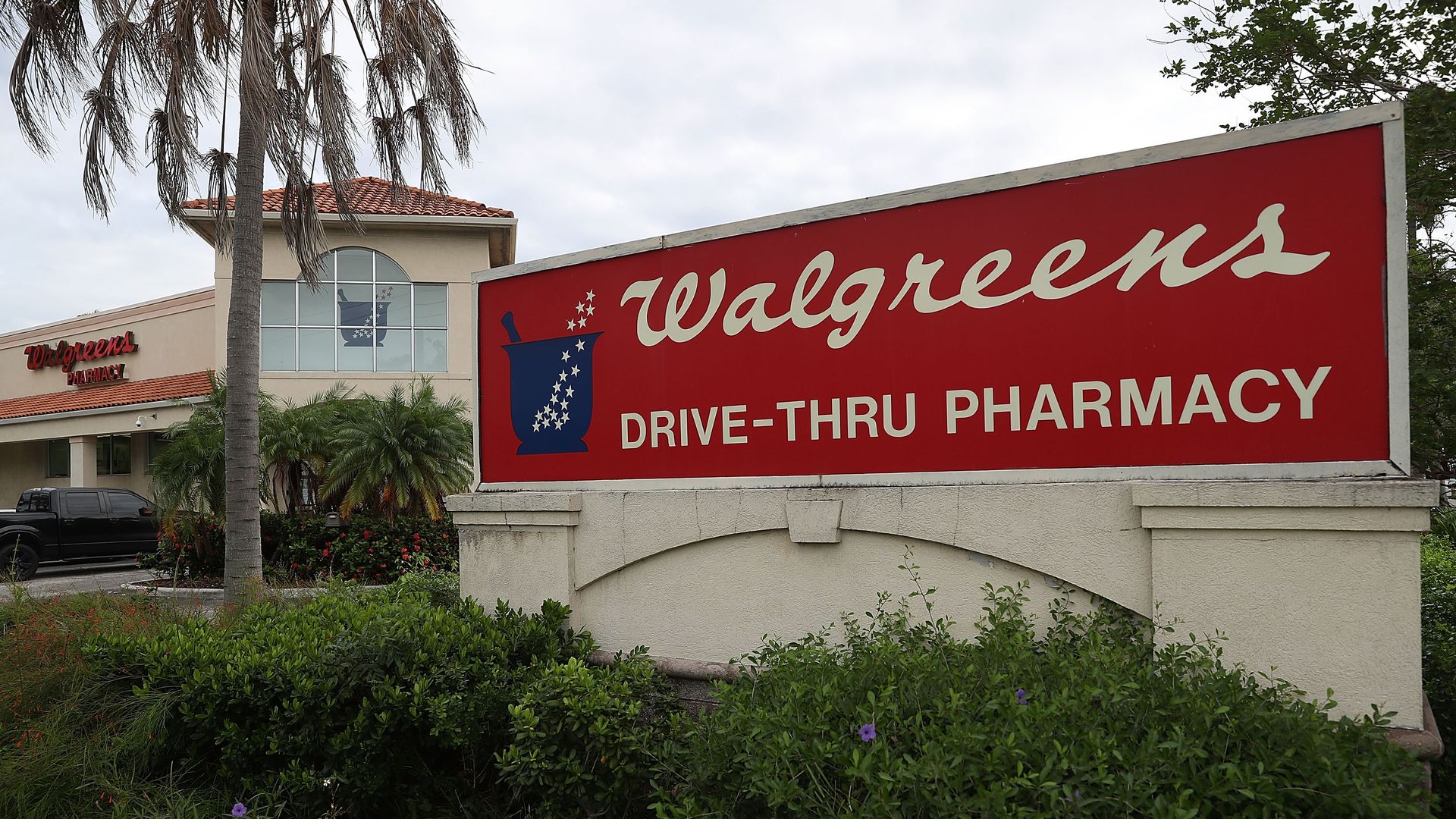 Walgreens pharmacy sign in front of the store