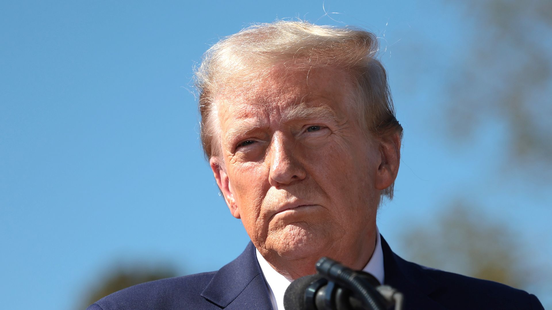 SWANNANOA, NORTH CAROLINA - OCTOBER 21: Republican presidential nominee, former U.S. President Donald Trump, delivers remarks as he visits a neighborhood affected by Hurricane Helene on October 21, 2024 in Swannanoa, North Carolina. Trump is campaigning throughout North Carolina today as he and Demo