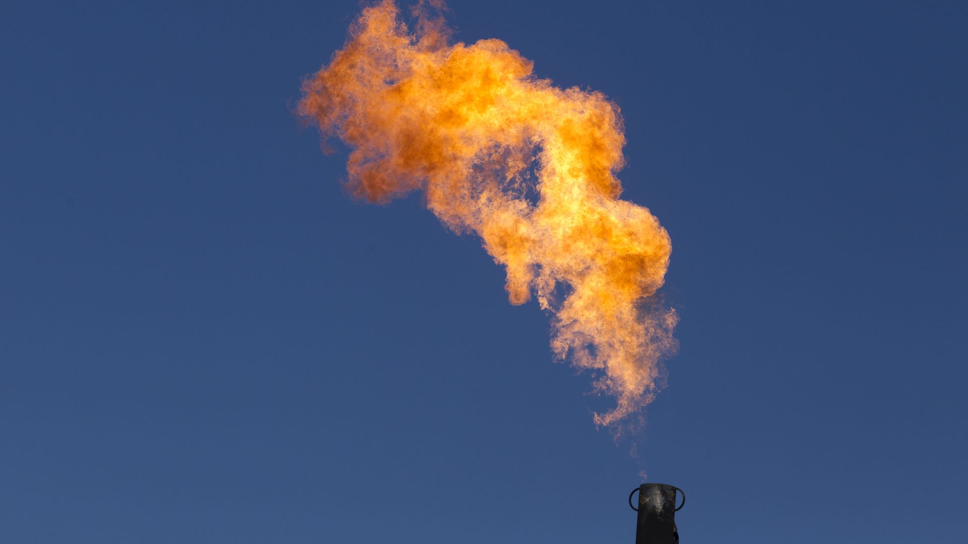 Excess natural gas is burned off at a well in Texas.