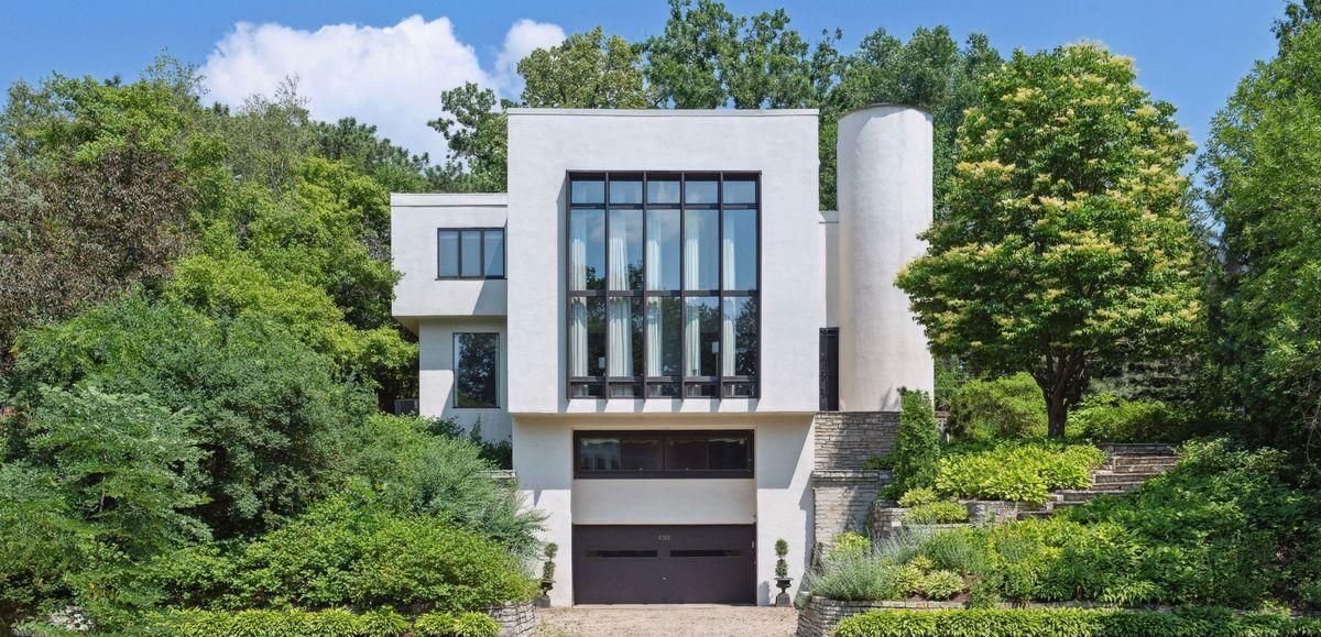 exterior of modern white and glass home