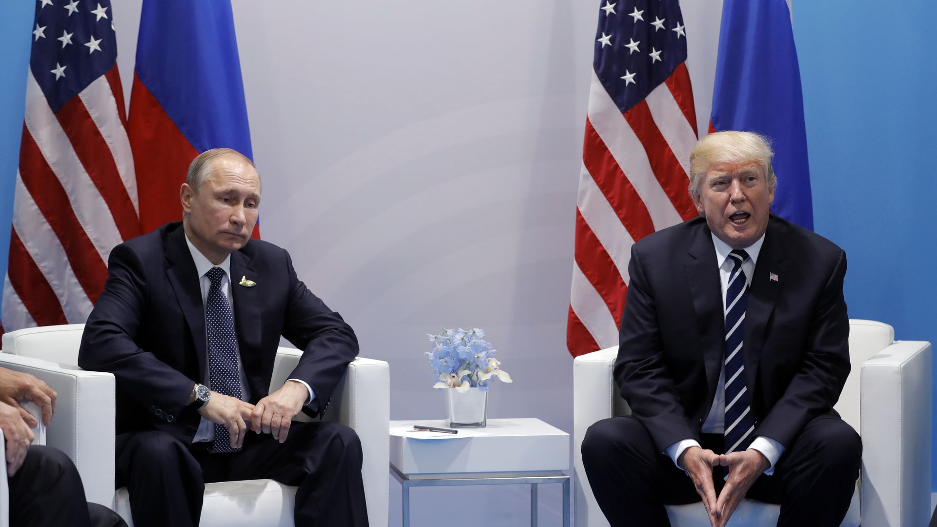 Trump and Putin sit across from one another during a bilateral meeting in Germany last year
