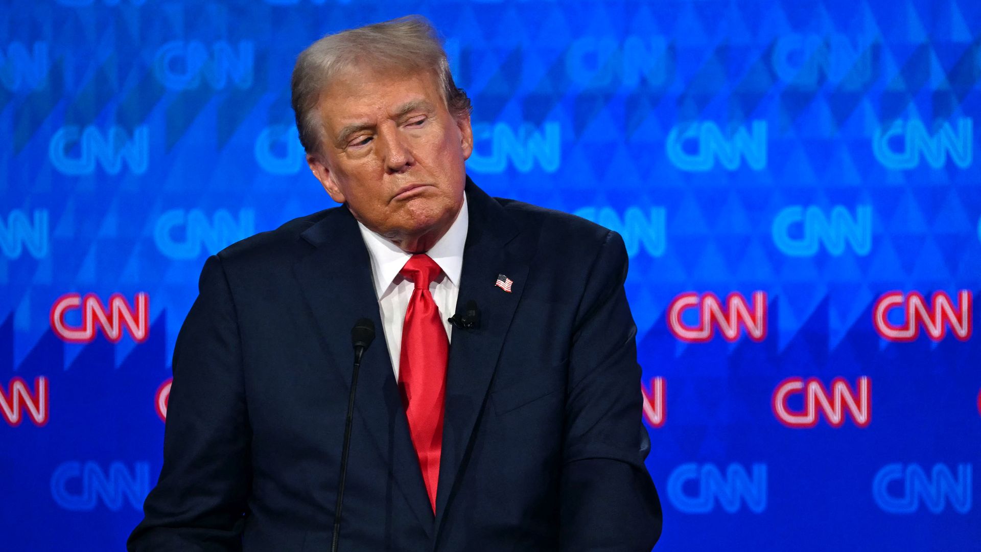 Republican presidential candidate Donald Trump leaves the stage during a commercial break as he participates in the first presidential debate 