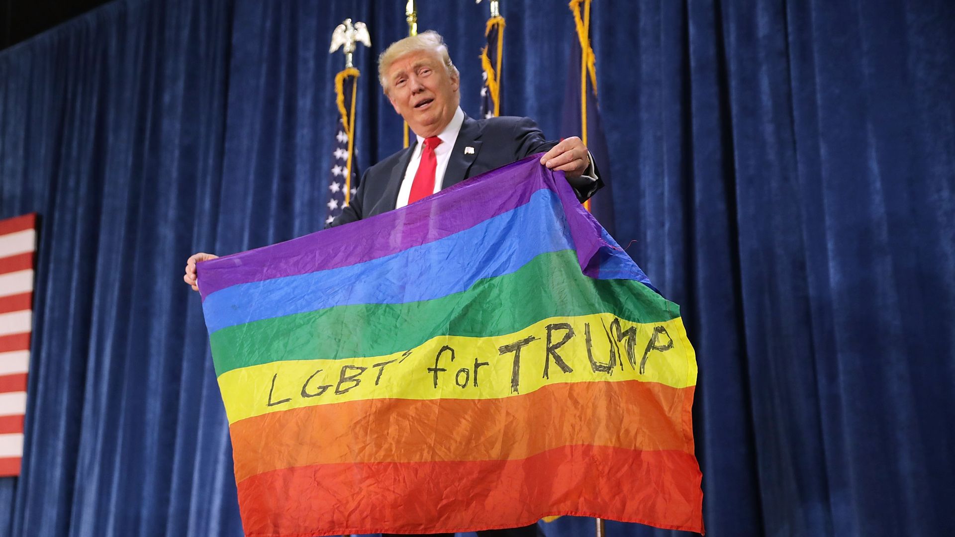 Trump with an LGBT flag