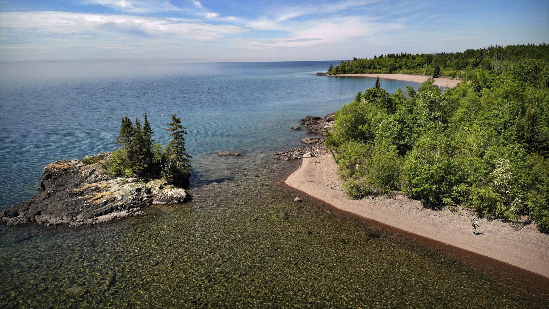 Lake Superior with an island and pine trees 