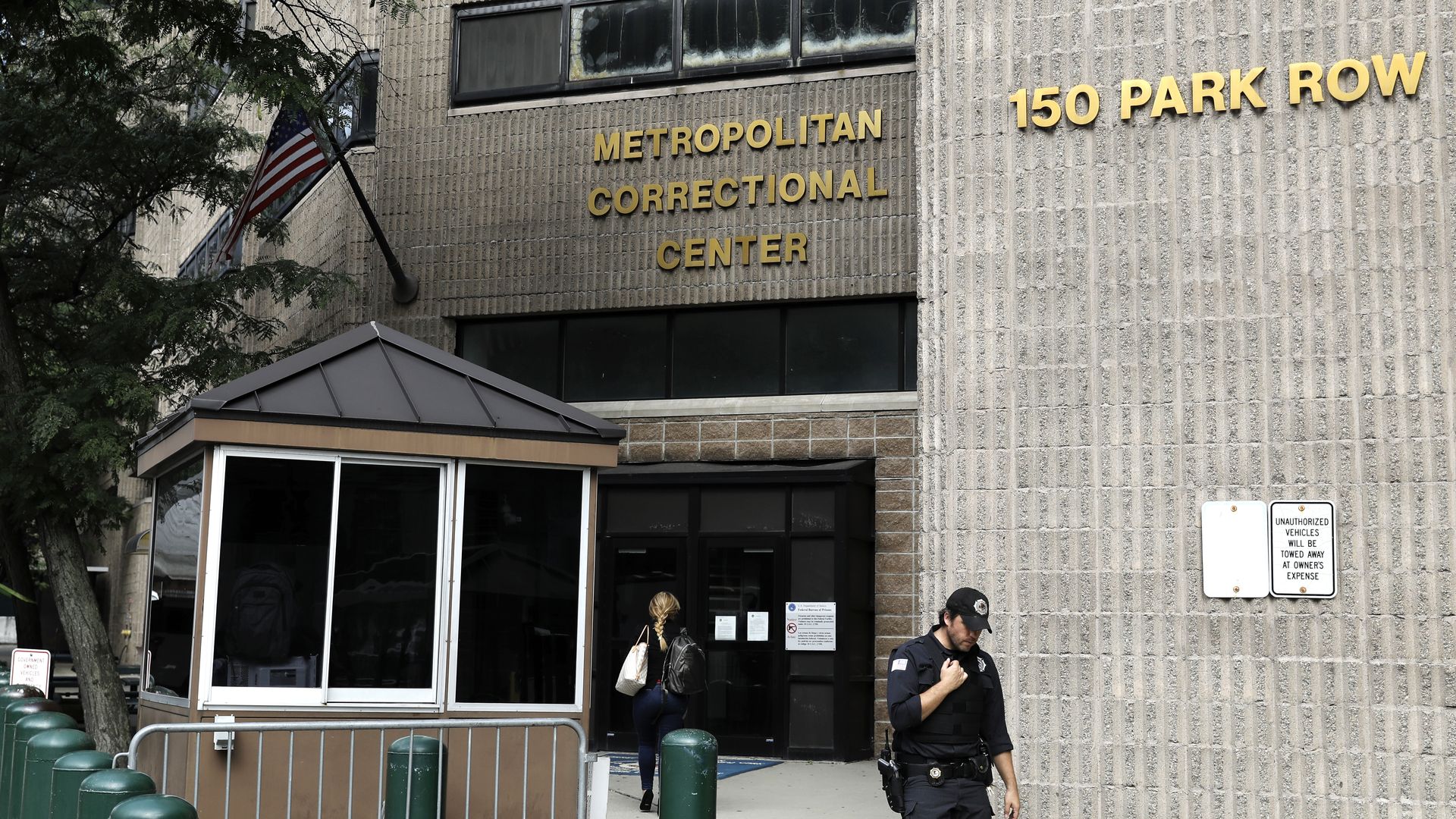 Photo of a police officer walking outside the Metropolitan Correctional Center, where Jeffrey Epstein has been held since his arrest, in New York, U.S.