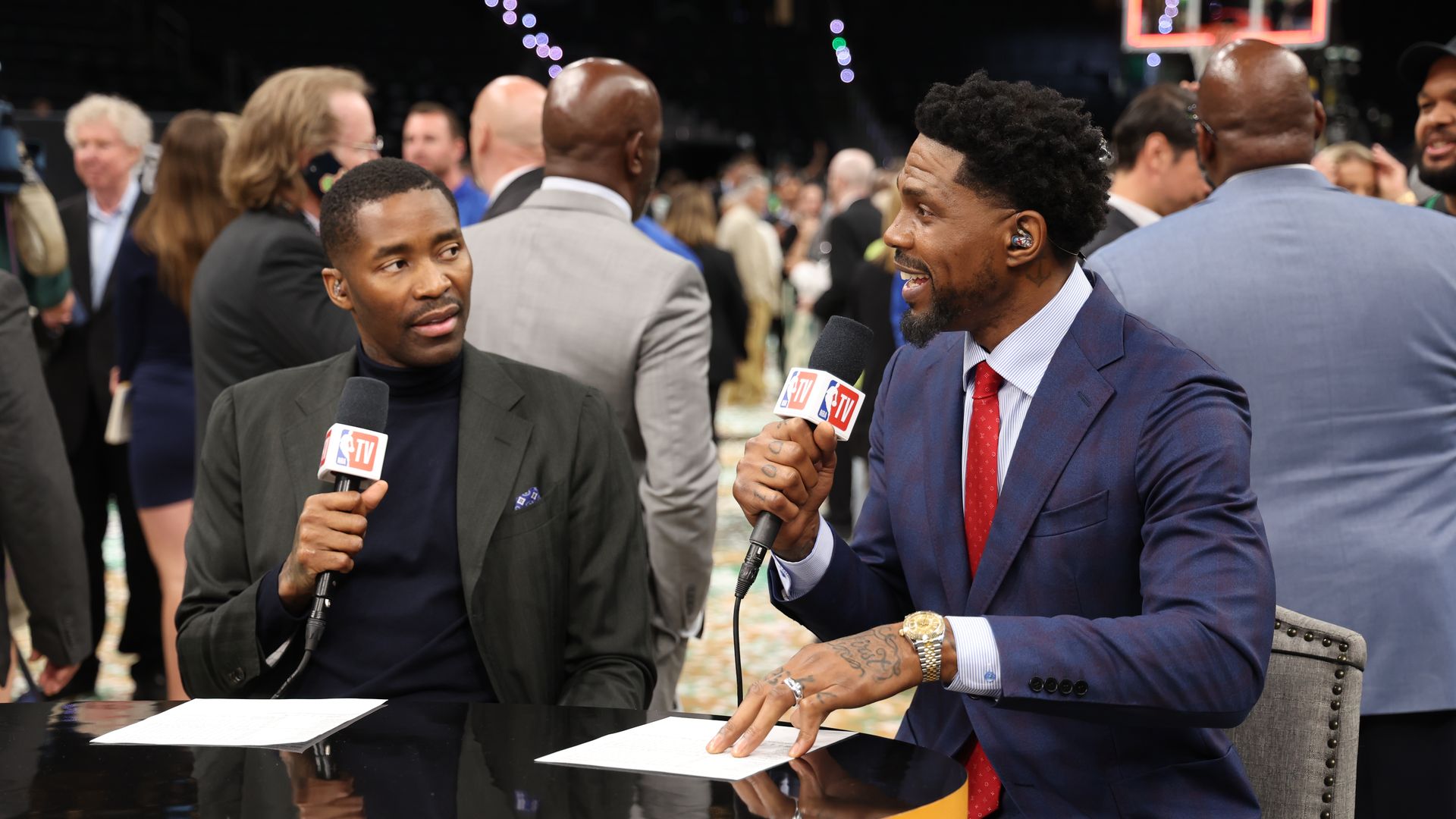 Udonis Haslem speaking into a microphone. 