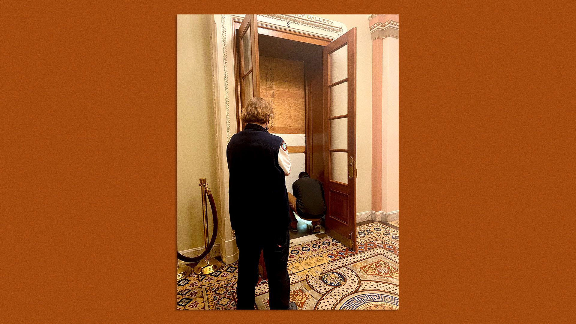 Architect of the Capitol staff assessing House chamber entryway.