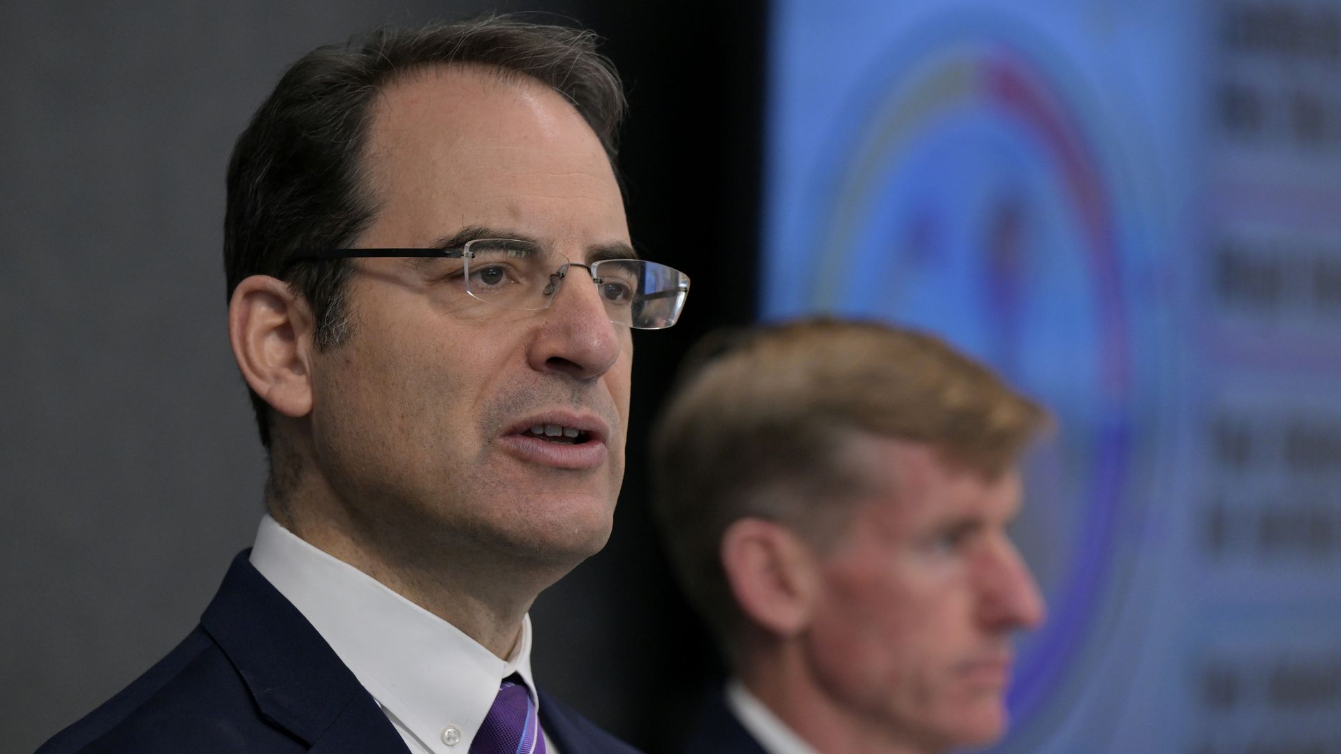 Colorado Attorney General Phil Weiser, left. Photo: Hyoung Chang/Denver Post via Getty Images