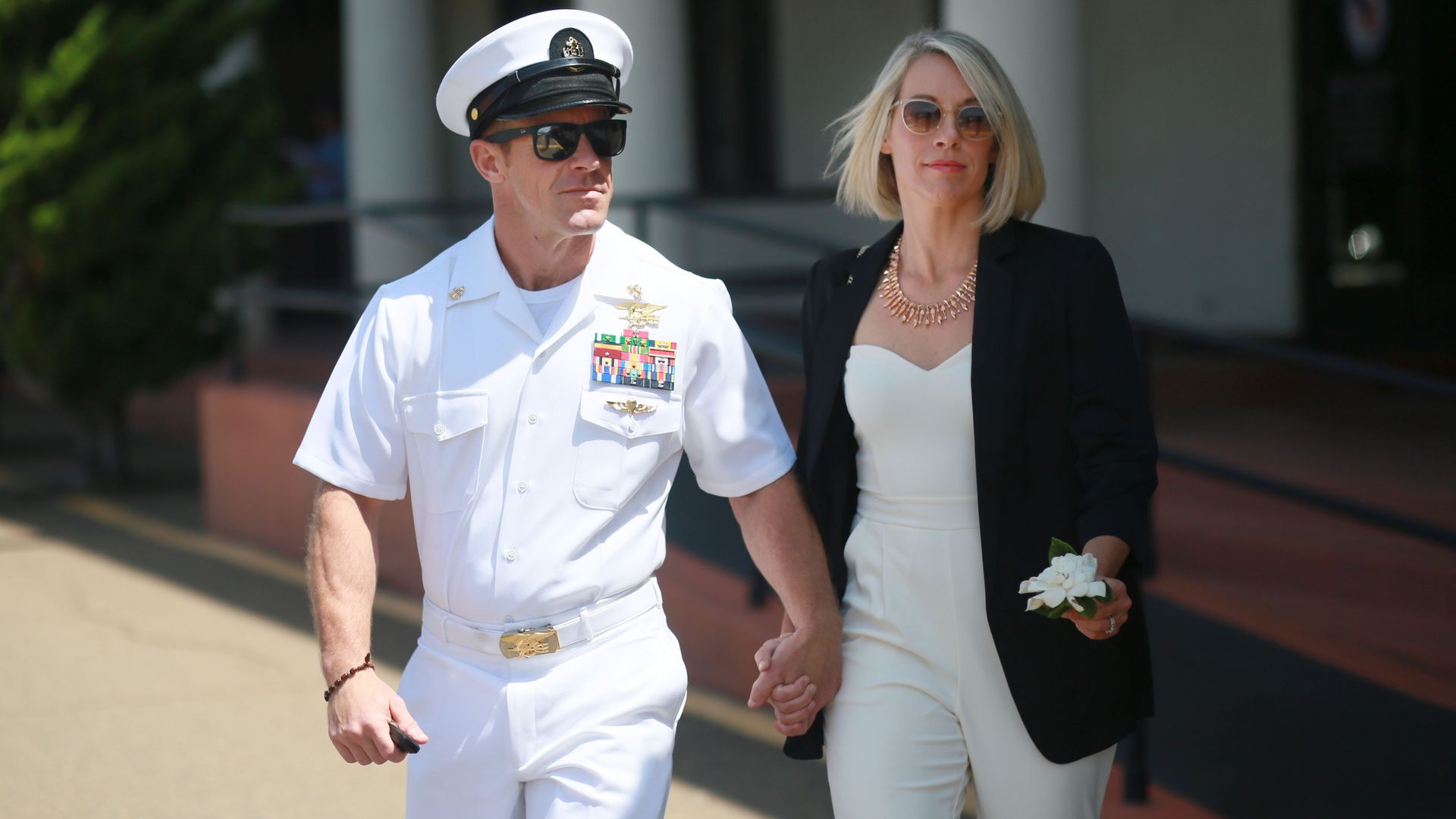 Navy Special Operations Chief Edward Gallagher walks out of military court with his wife