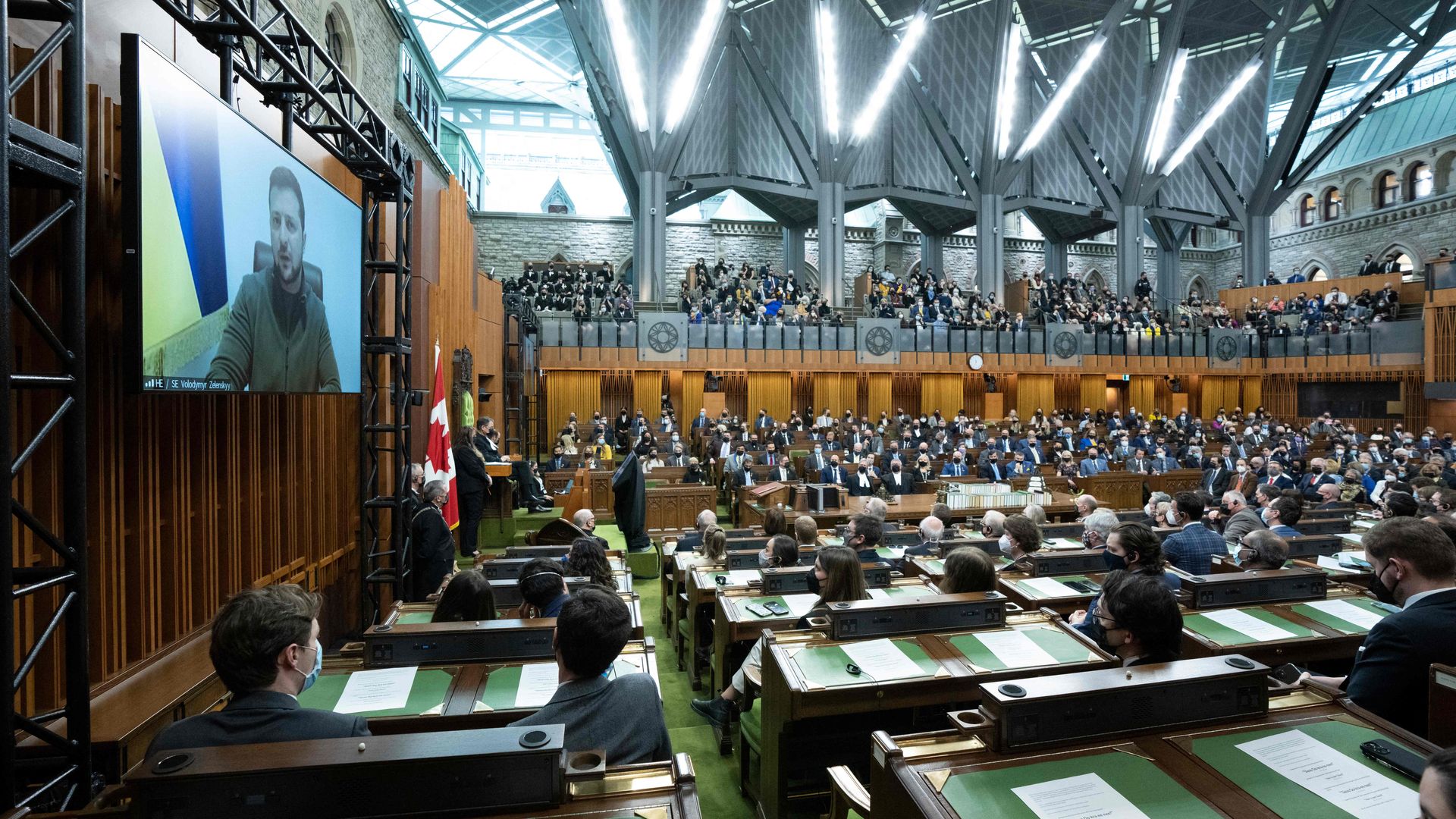 Ukrainian President Zelensky is seen addressing the Canadian Parliament.